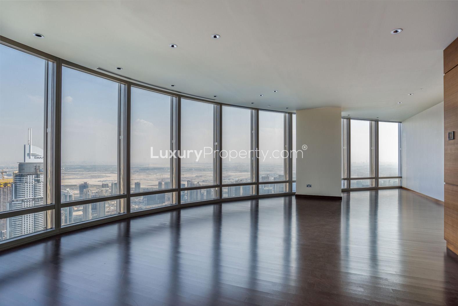 Spacious living room with floor-to-ceiling windows in Burj Khalifa, Downtown Dubai apartment