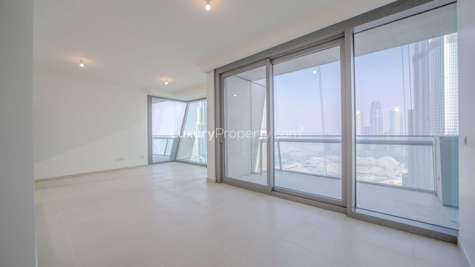 Immaculate Burj Vista Apartment living room with floor-to-ceiling windows, Downtown Dubai view