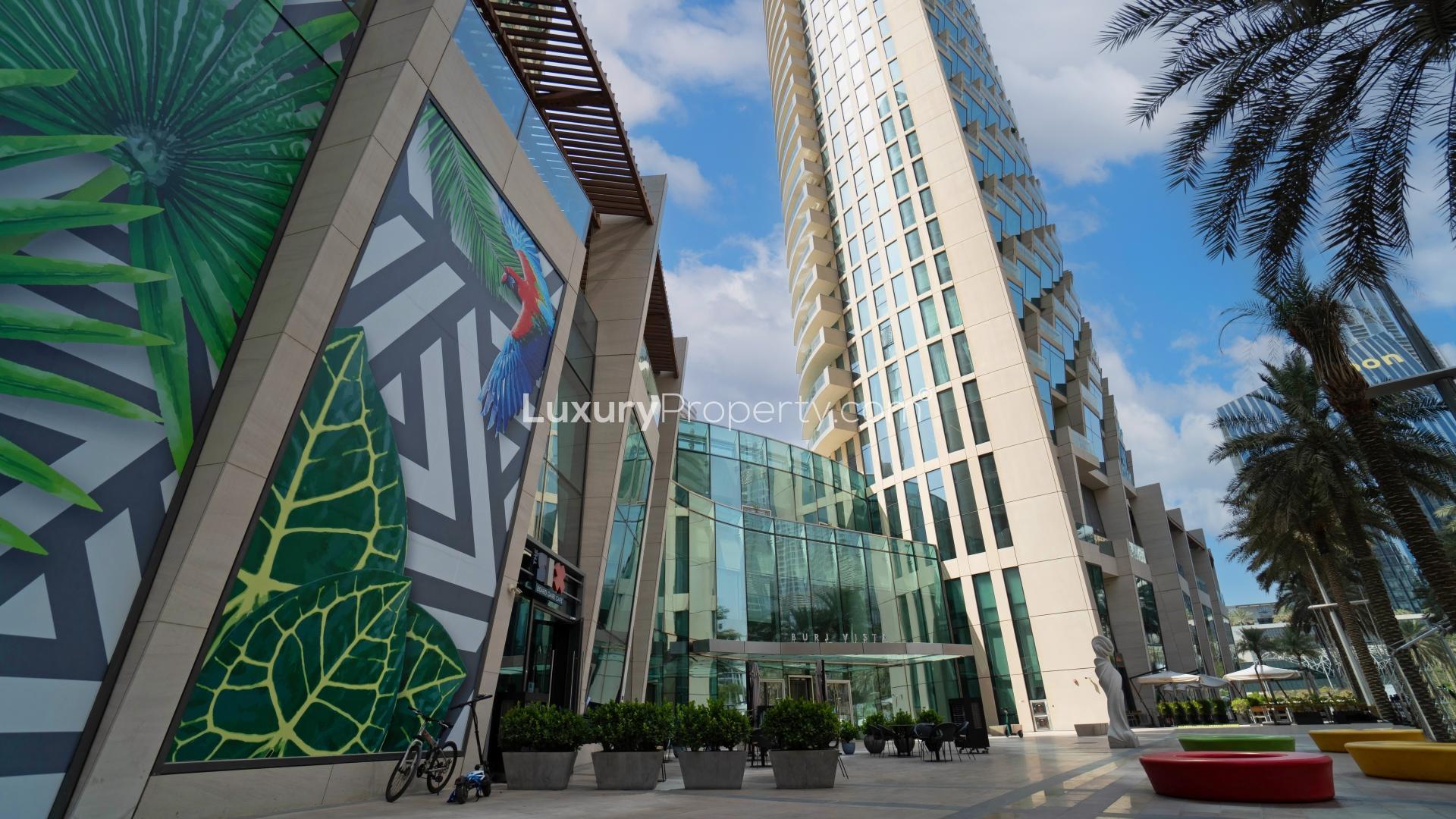 Aerial view of Burj Vista apartment pool and surrounding greenery in Downtown Dubai