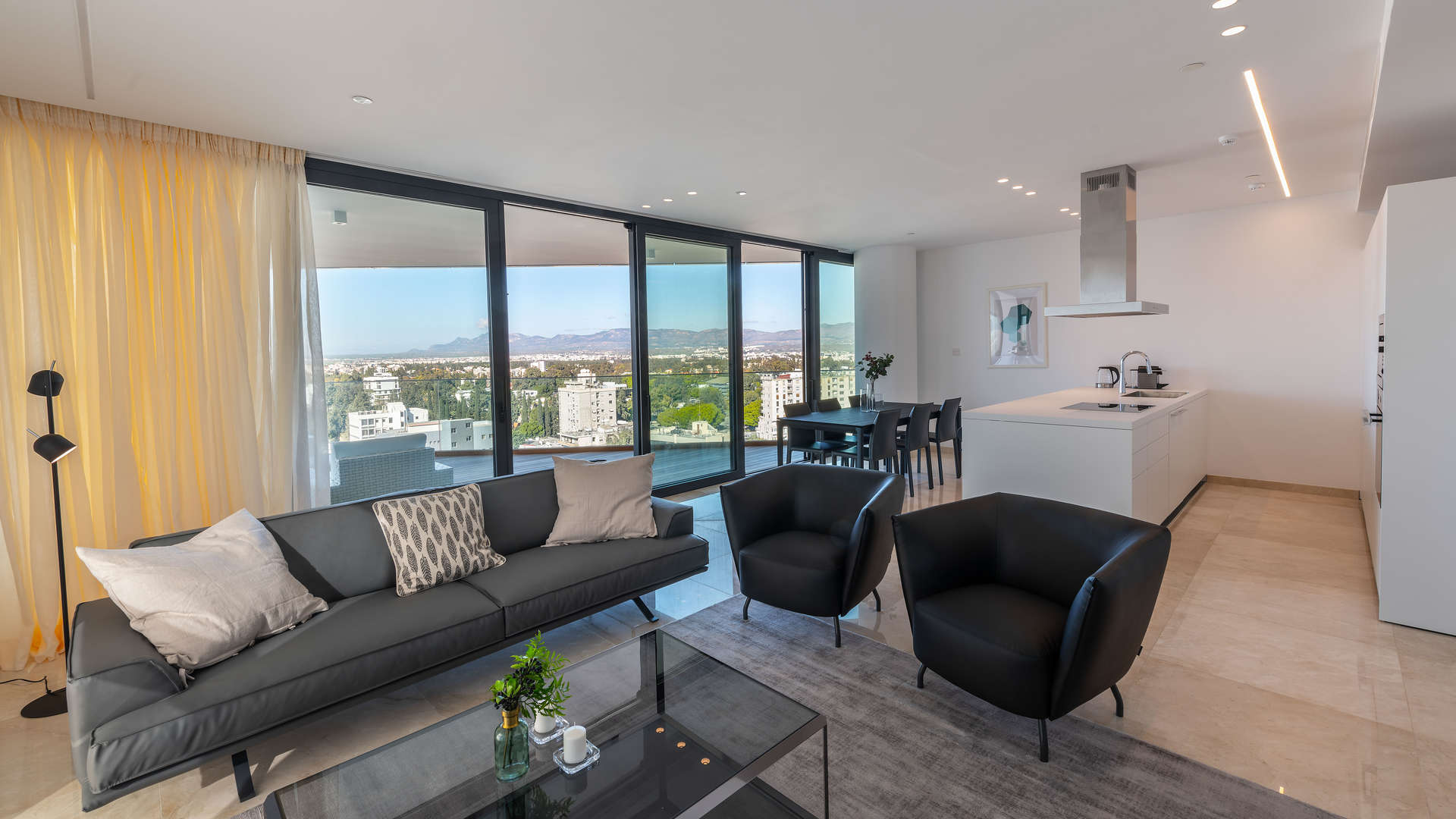 Modern living room and kitchen in Central Park Residences apartment, Nicosia, Cyprus