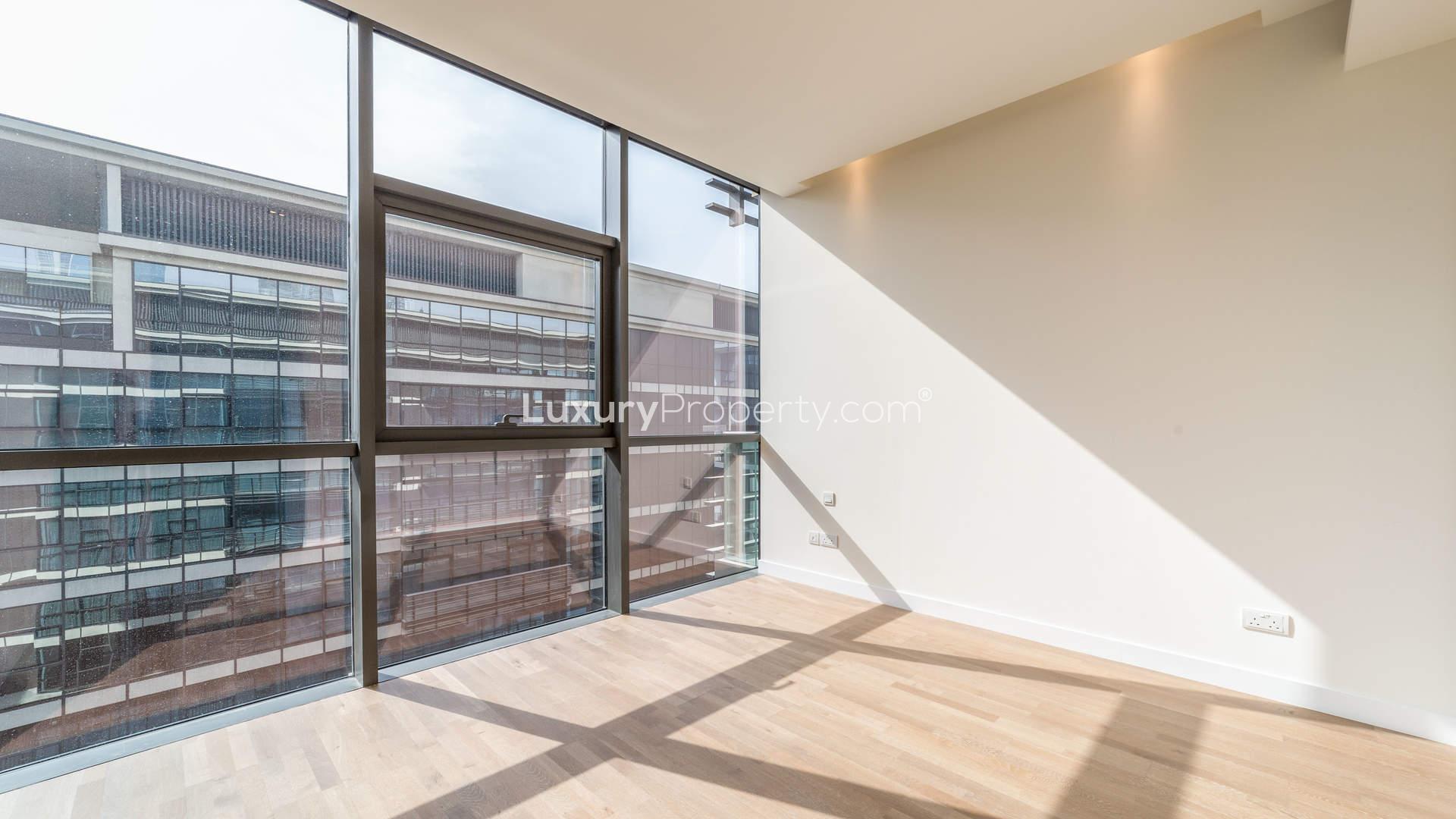 Bright bedroom in 3-bed luxury apartment, City Walk, Jumeirah, featuring built-in wardrobes