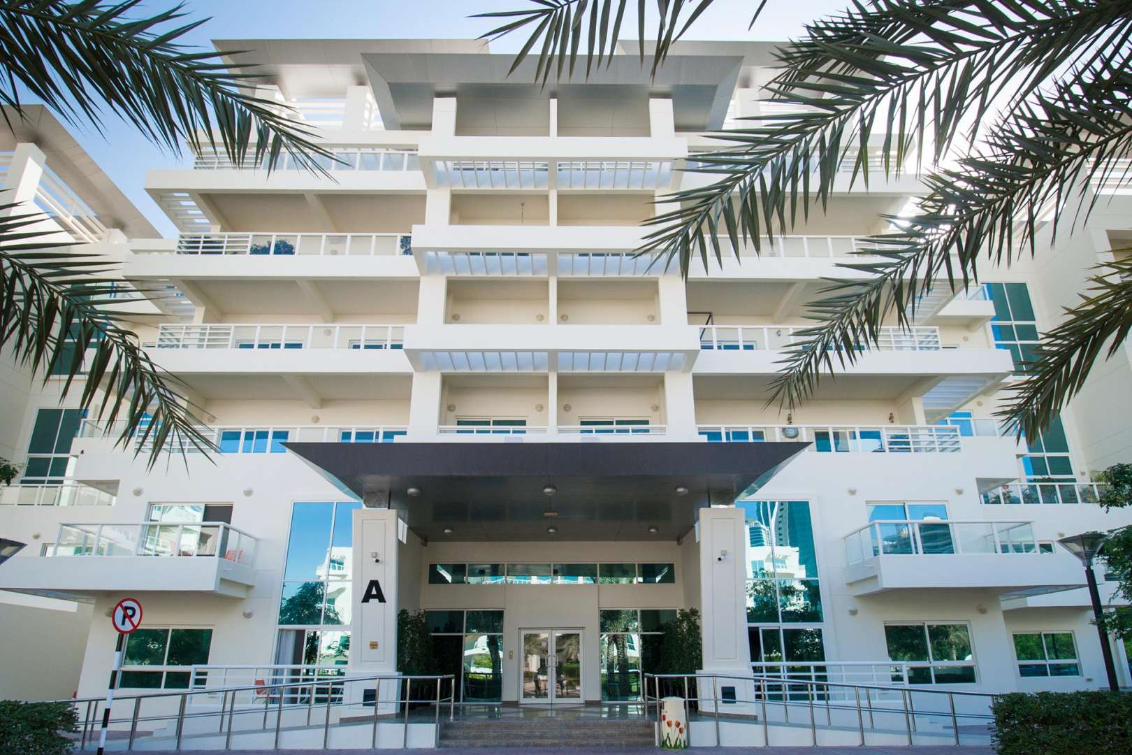 Exterior view of modern apartment building in Jumeirah Heights, Cluster D, for rent