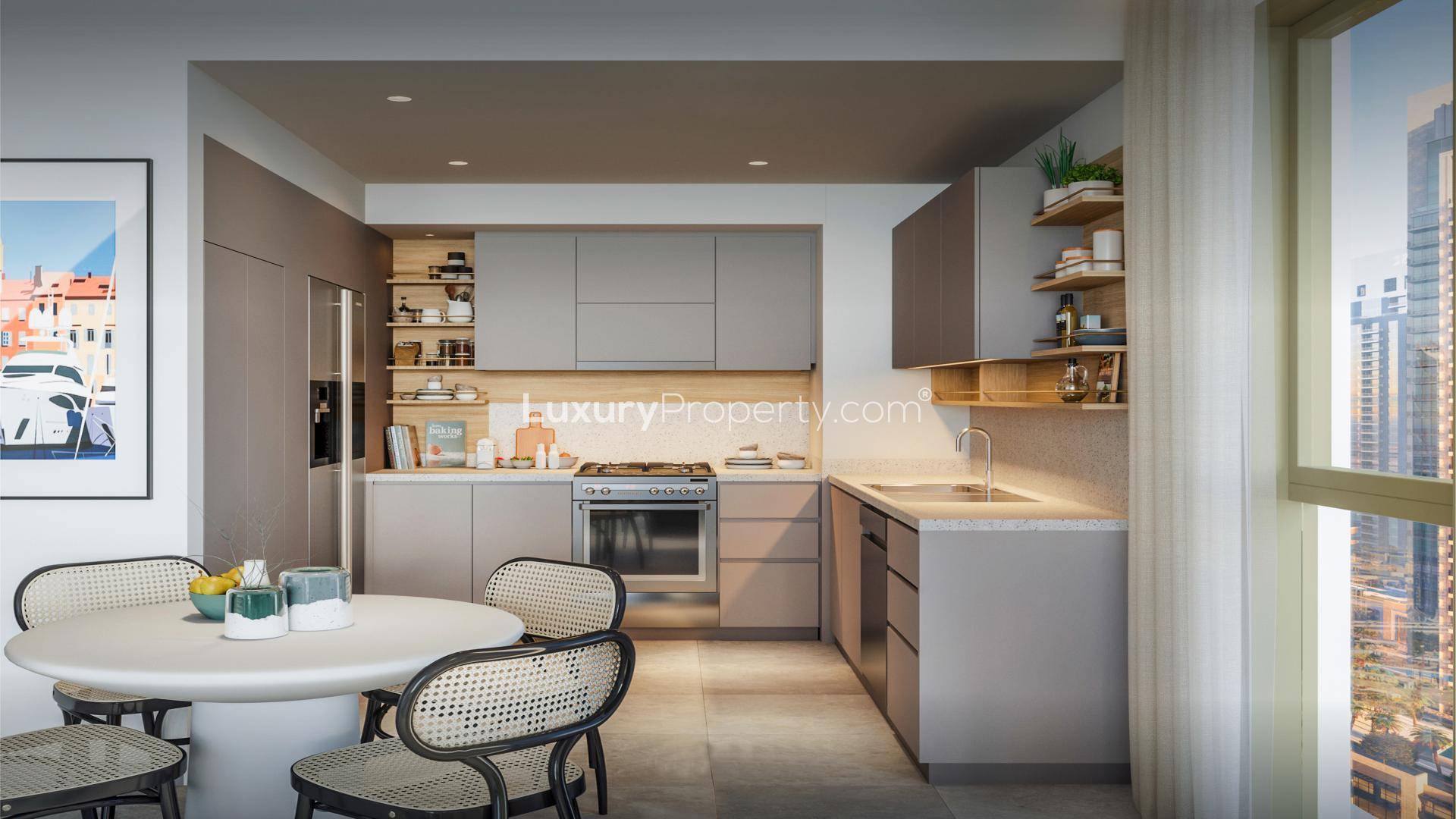 Modern kitchen in a 3-bedroom apartment, Creek Crescent, Dubai Creek Harbour, for sale