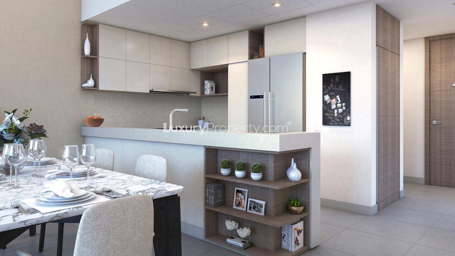 Modern living and dining area in elegant apartment with stunning waterfront views, Creek Gate