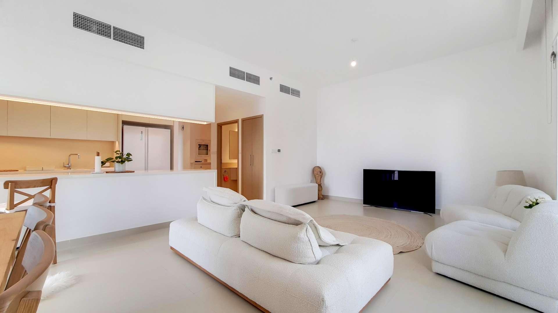 Modern living room and kitchen in 3-bedroom apartment, Creek Horizon, Dubai Creek Harbour