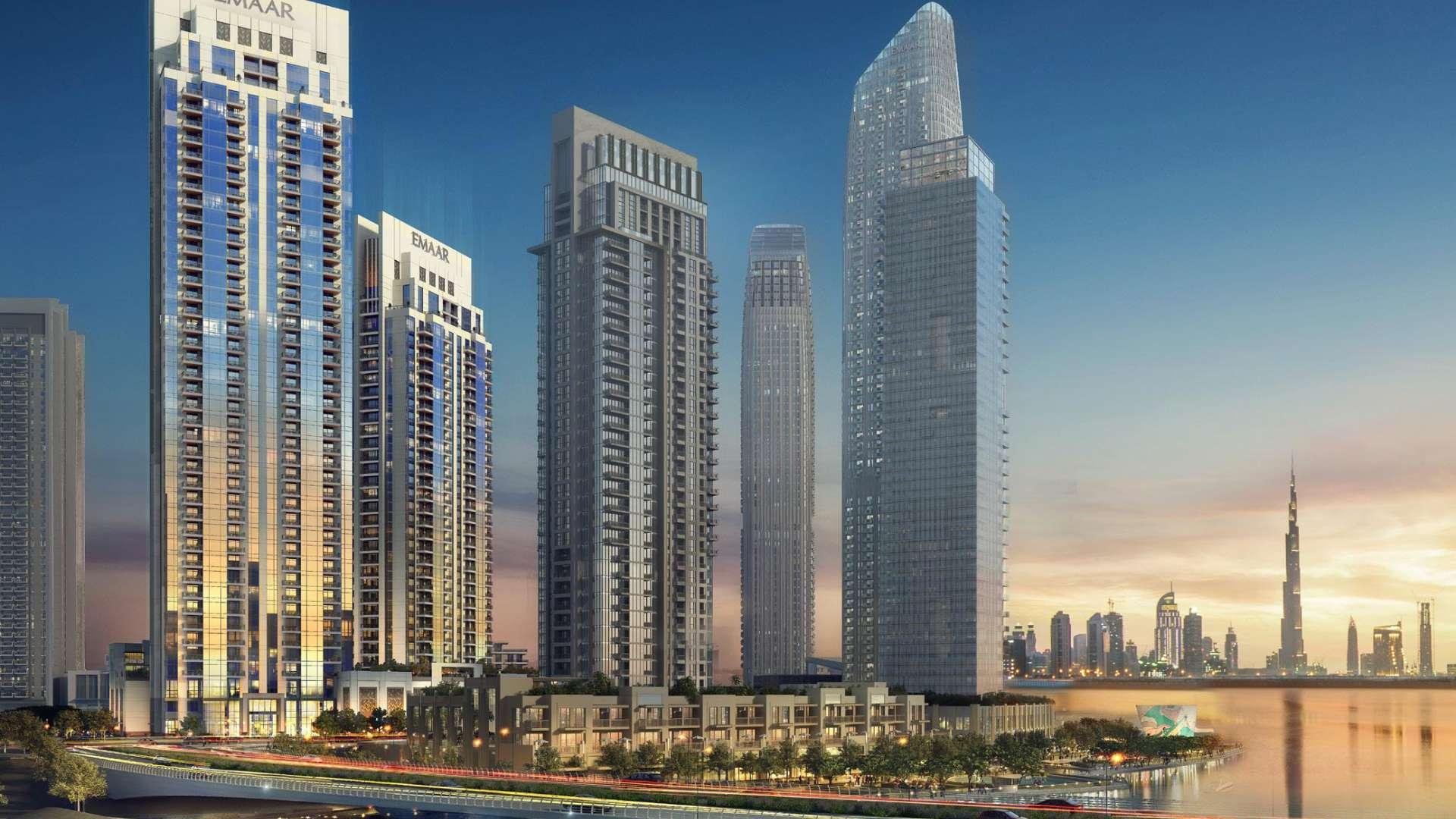 Aerial view of Dubai Creek Harbour skyline, showcasing luxury apartments and waterfront scenery