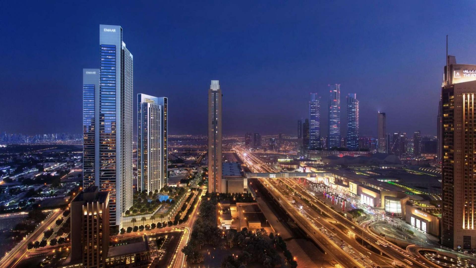 Downtown Dubai skyline view with modern high-rise apartments and iconic architecture at sunset