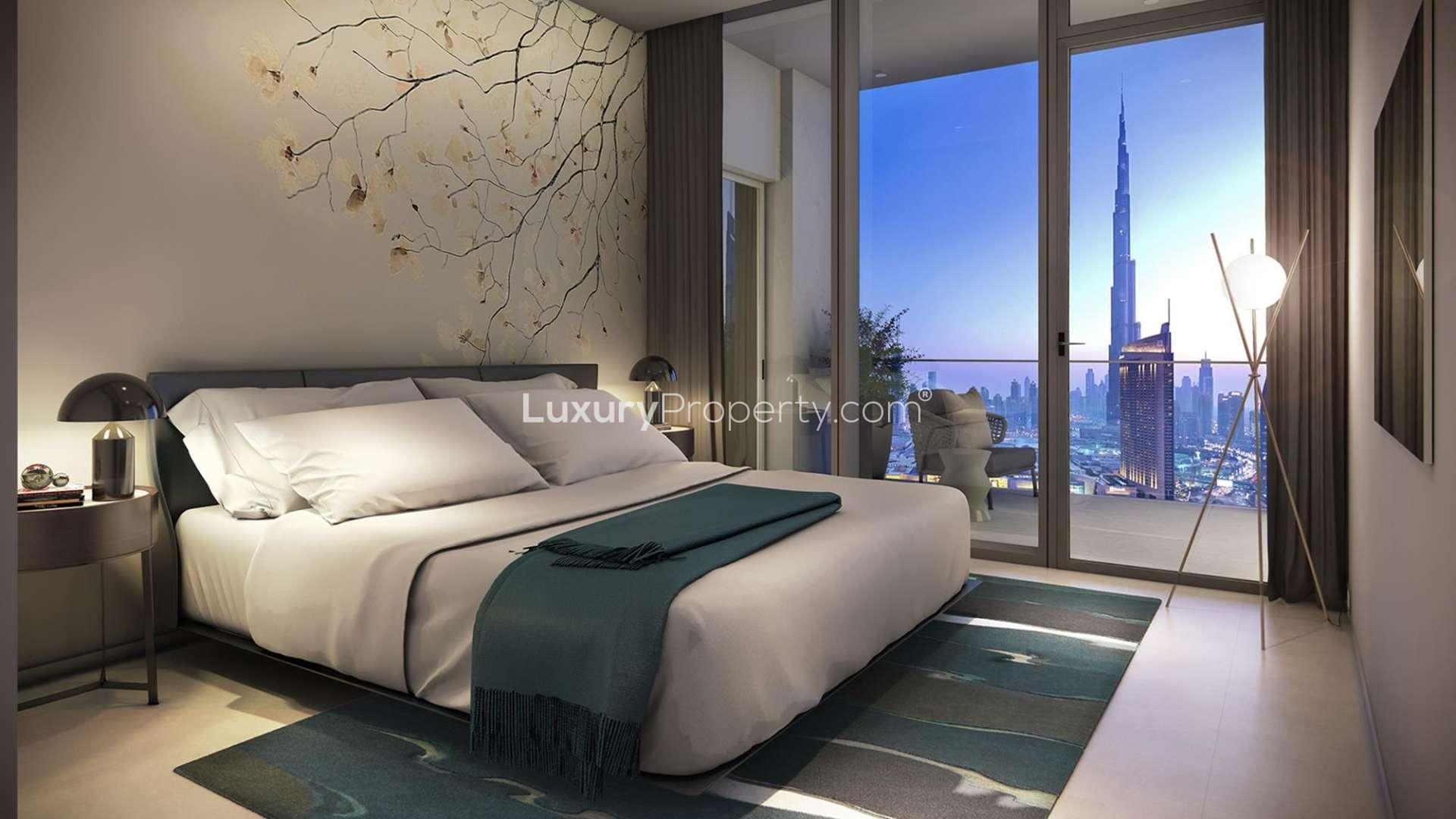 Modern kitchen in Downtown Dubai apartment with Burj Khalifa view, featuring sleek design elements