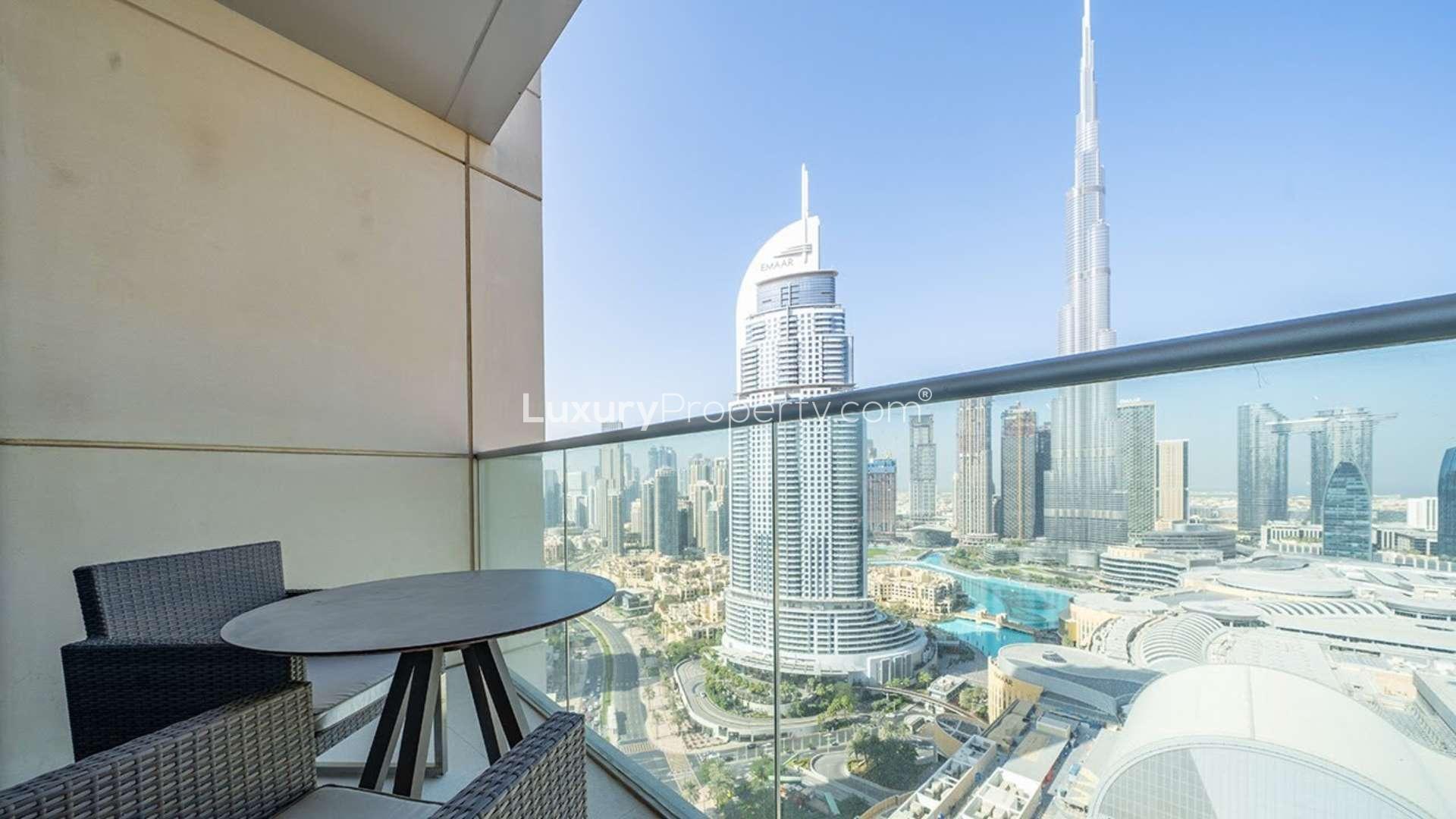 Modern kitchen in Downtown Dubai apartment with Burj Khalifa view, sleek design, natural light