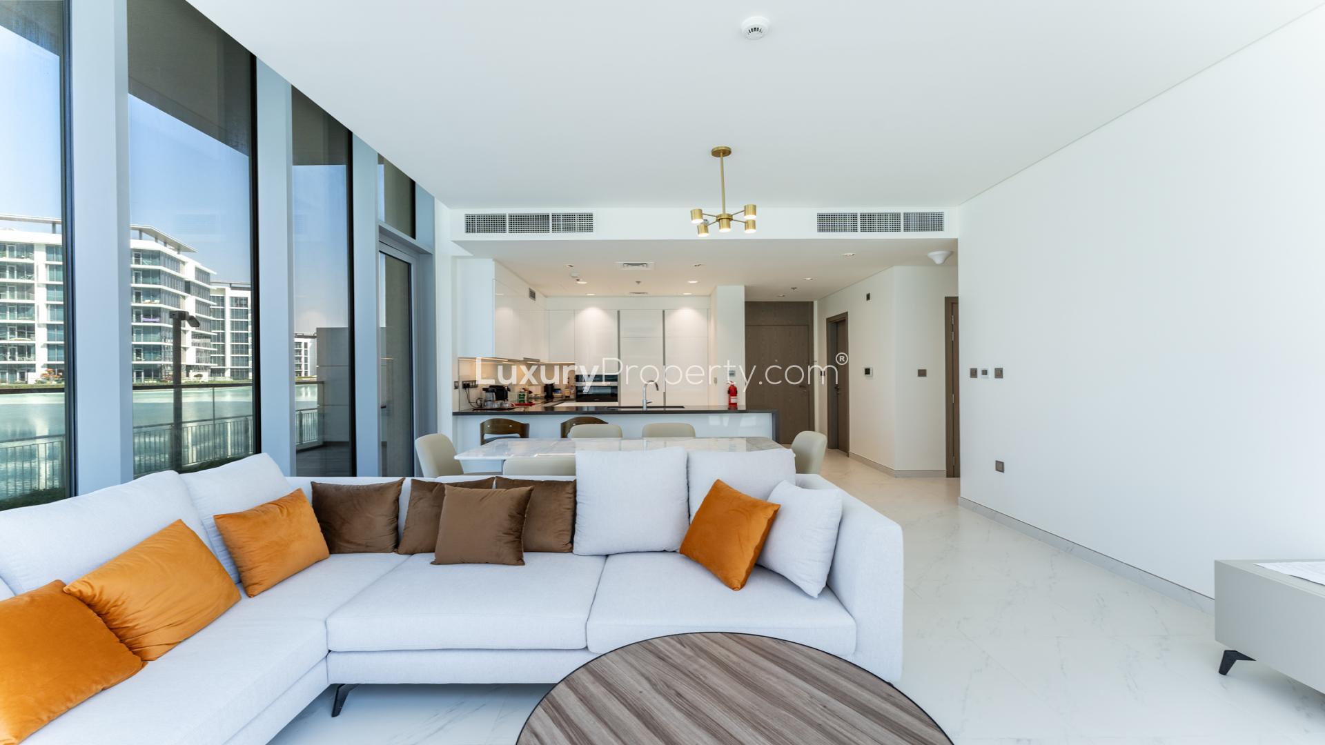 Modern apartment balcony view overlooking pool in District One, MBR City, for sale