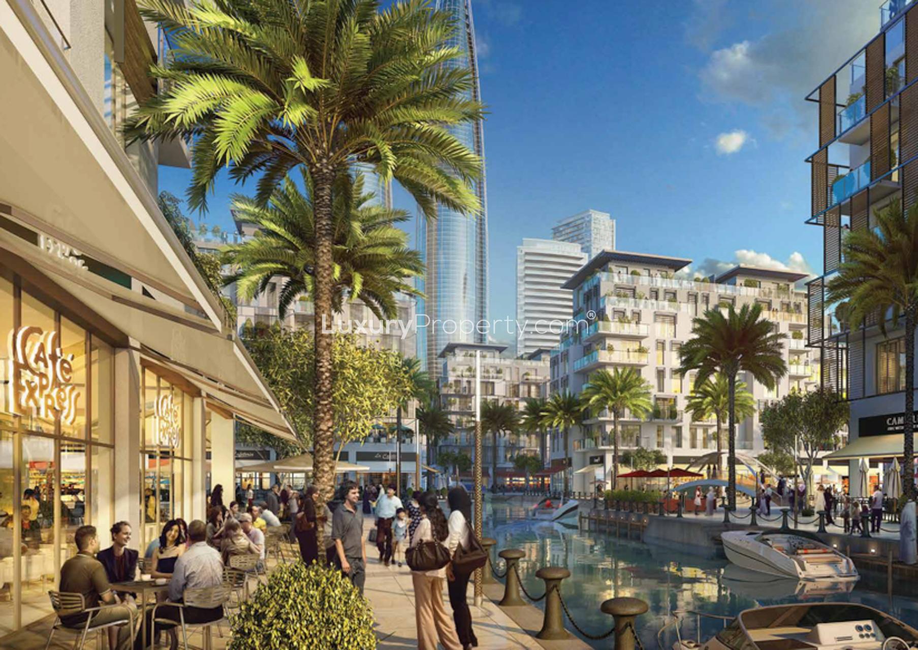 Aerial view of Dubai Creek Harbour skyline with waterfront and luxury yachts