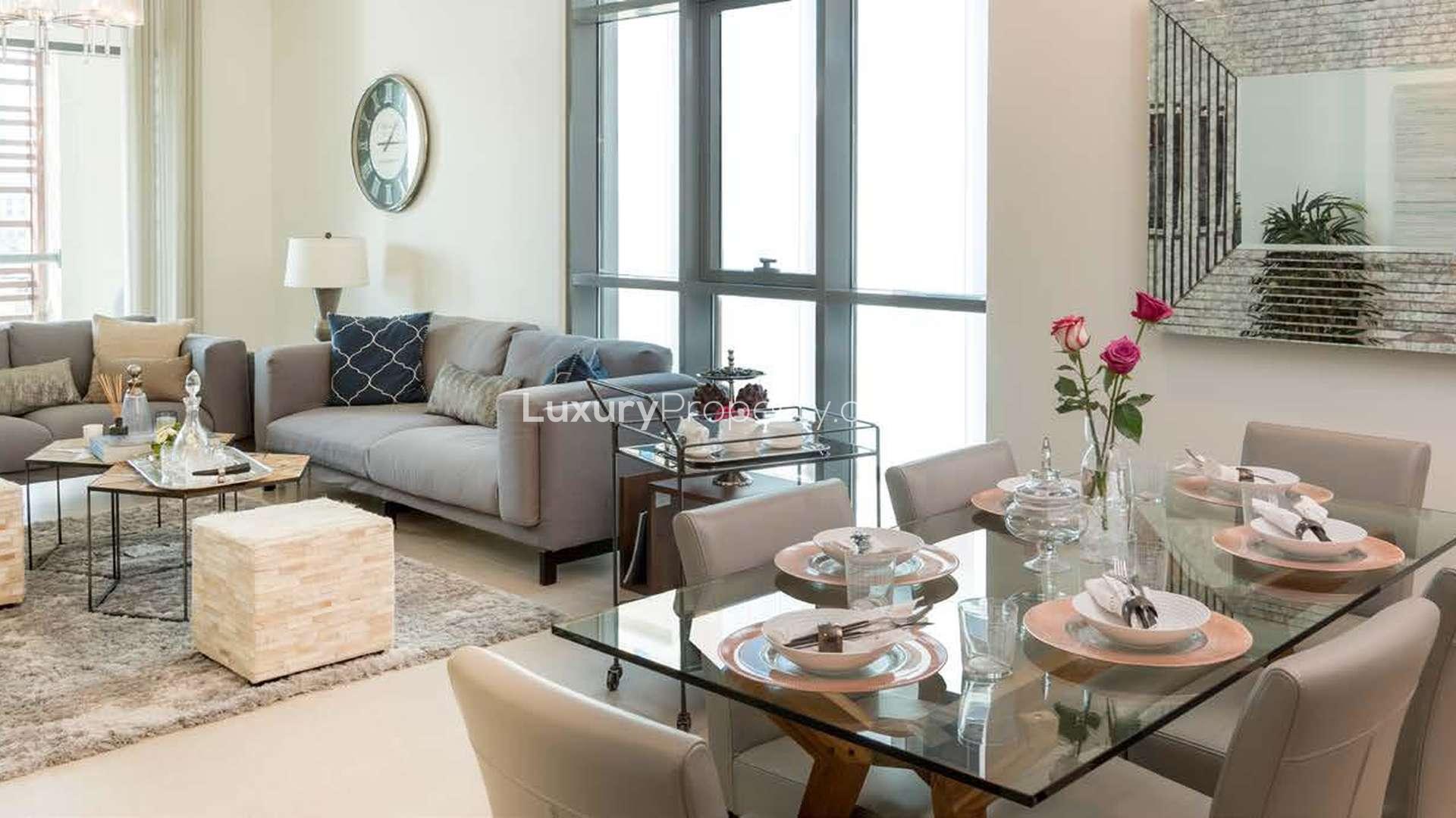 Luxury waterfront apartment exterior at Dubai Wharf, Culture Village, featuring modern architecture