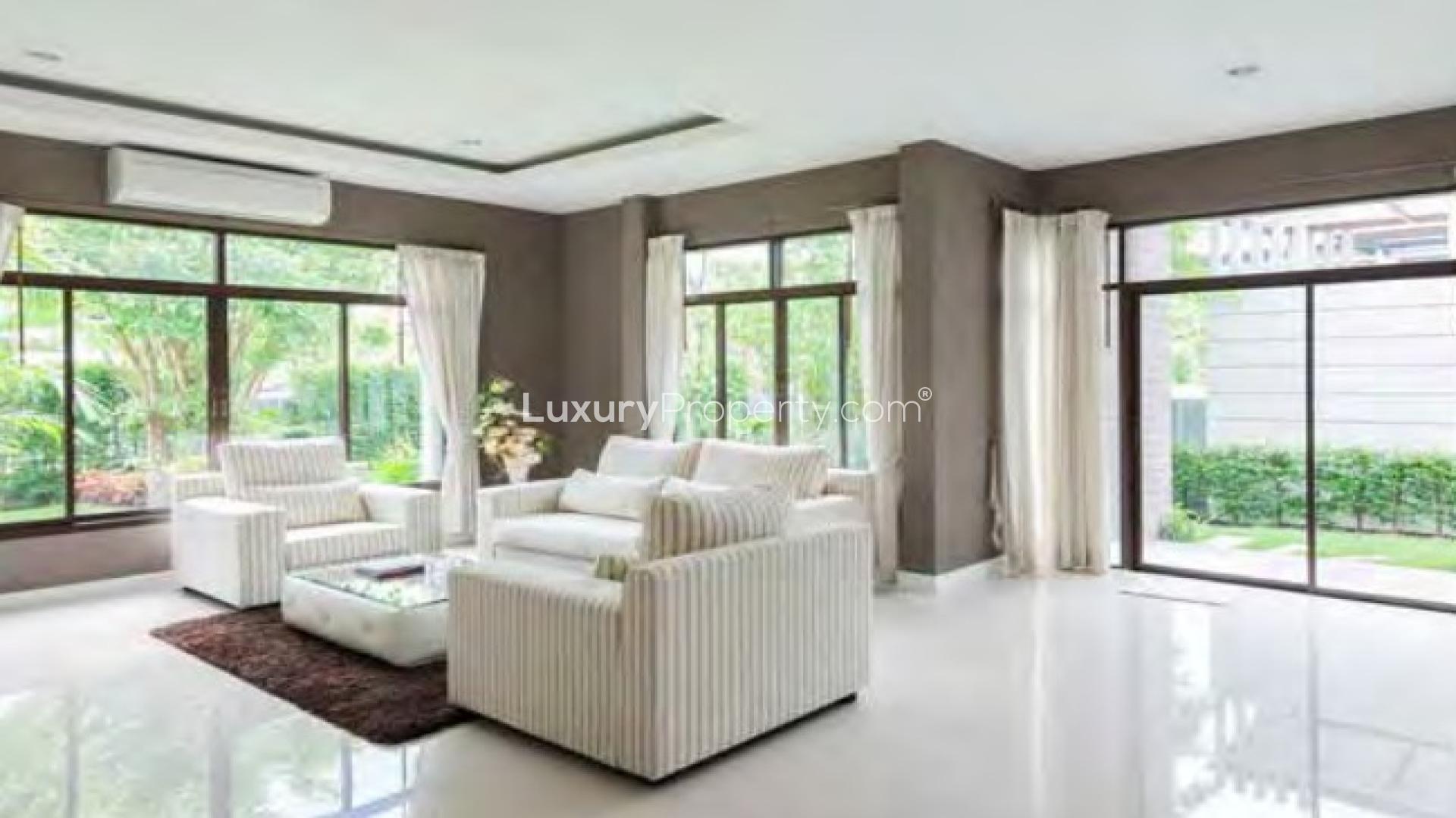 Elegant living room in Living Legends Queen Sheba apartment for sale, featuring stylish decor