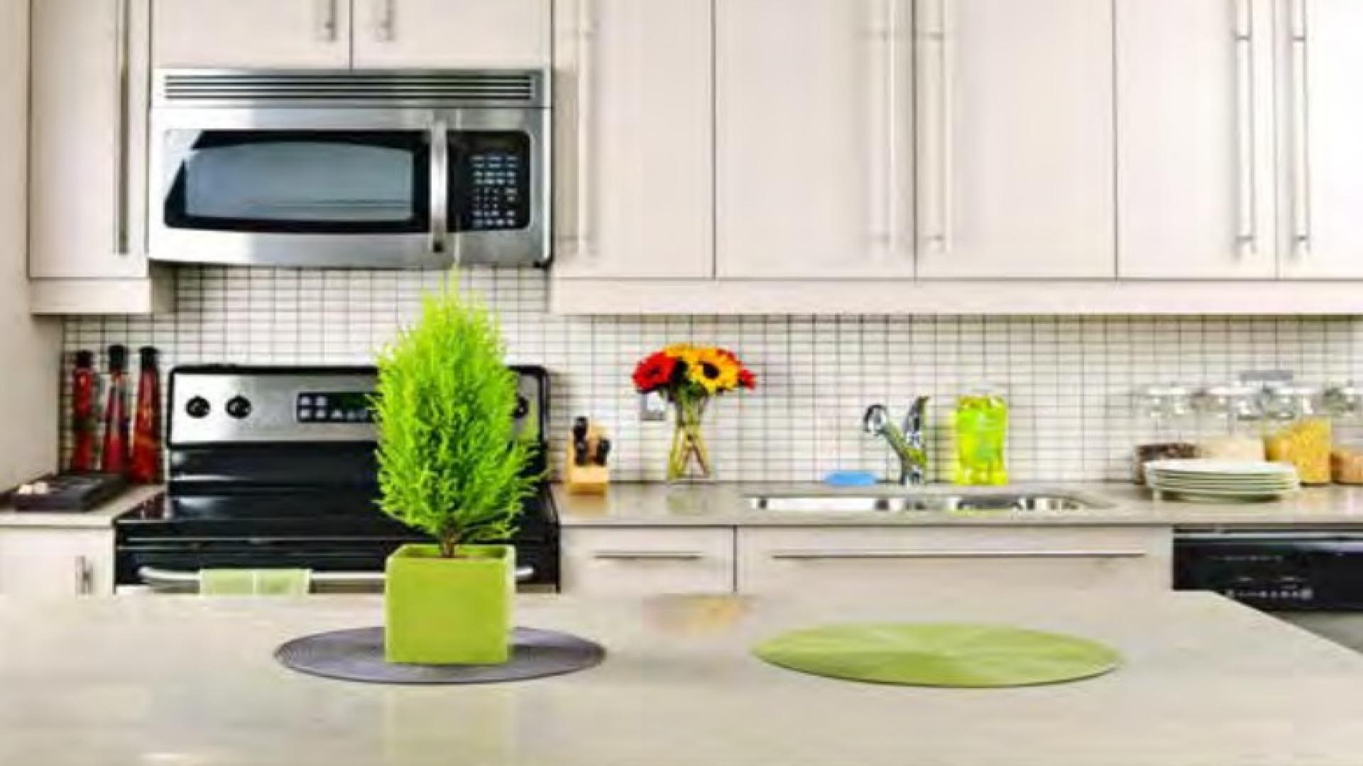 Modern living room and dining area in Queen Sheba apartment, Living Legends community