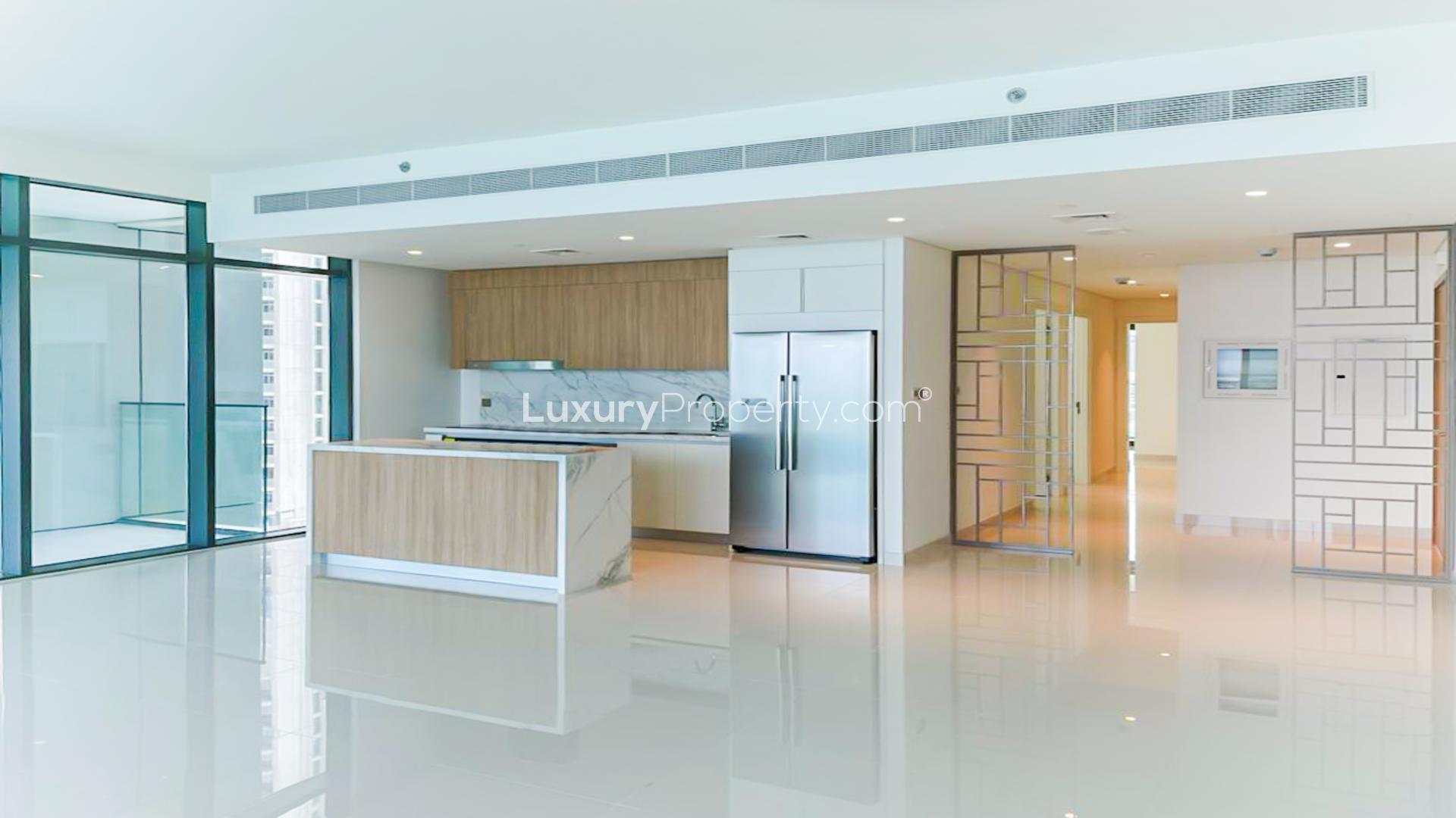 Luxury beachfront apartment view with balcony, overlooking Dubai Harbour and Emaar Beachfront