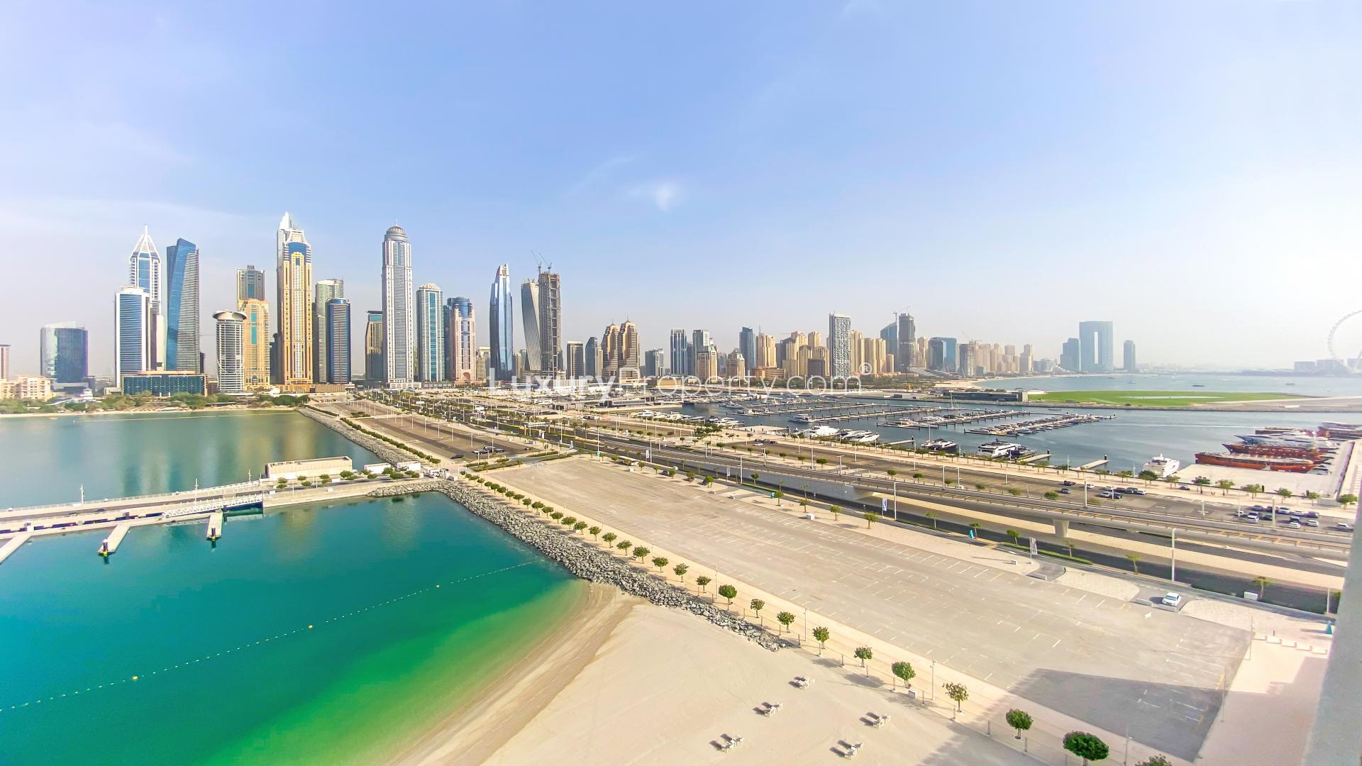 Emaar Beachfront apartment balcony with marina skyline view, Dubai Harbour