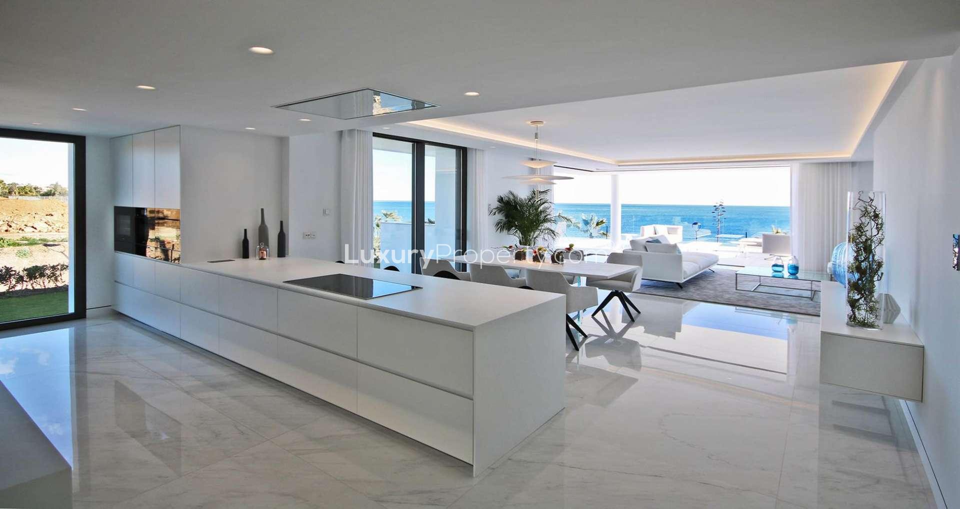 Luxury beachfront apartment terrace with stunning sea views in Estepona, Marbella