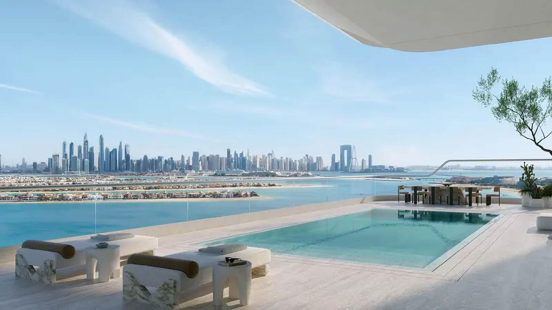 Luxurious Palm Jumeirah apartment living room with stunning city skyline view for sale