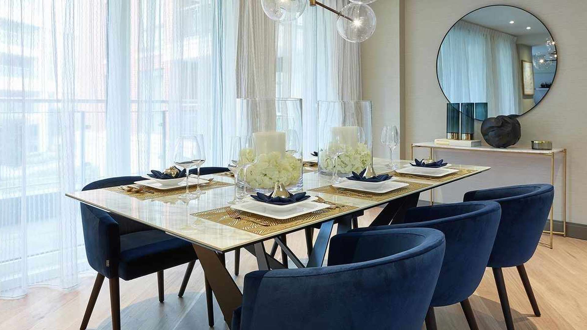 Modern living and dining area in Chelsea Creek Fairwater House apartment, elegant decor