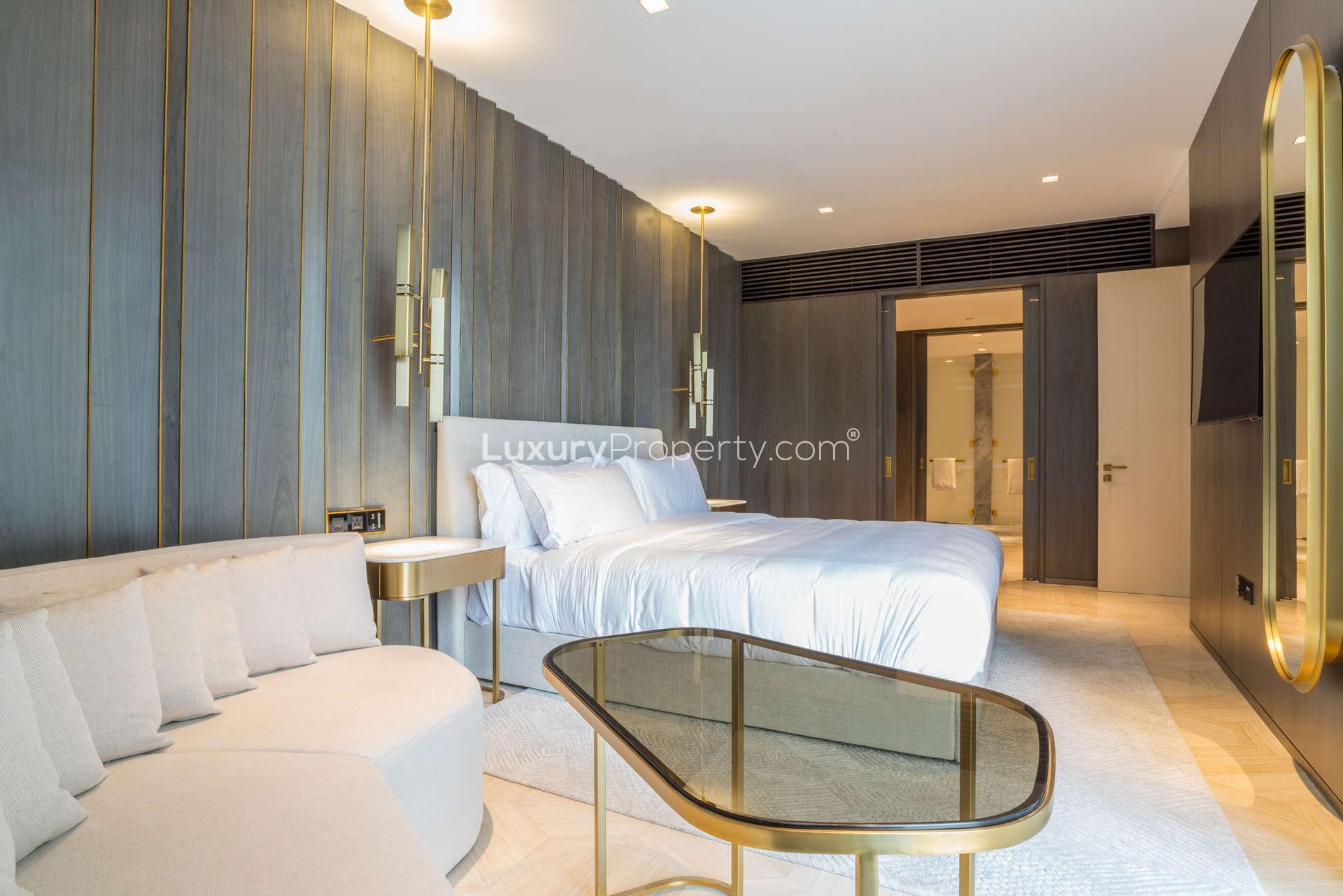 Luxurious living room in 3-bedroom apartment, Five Palm Jumeirah, modern decor, spacious seating