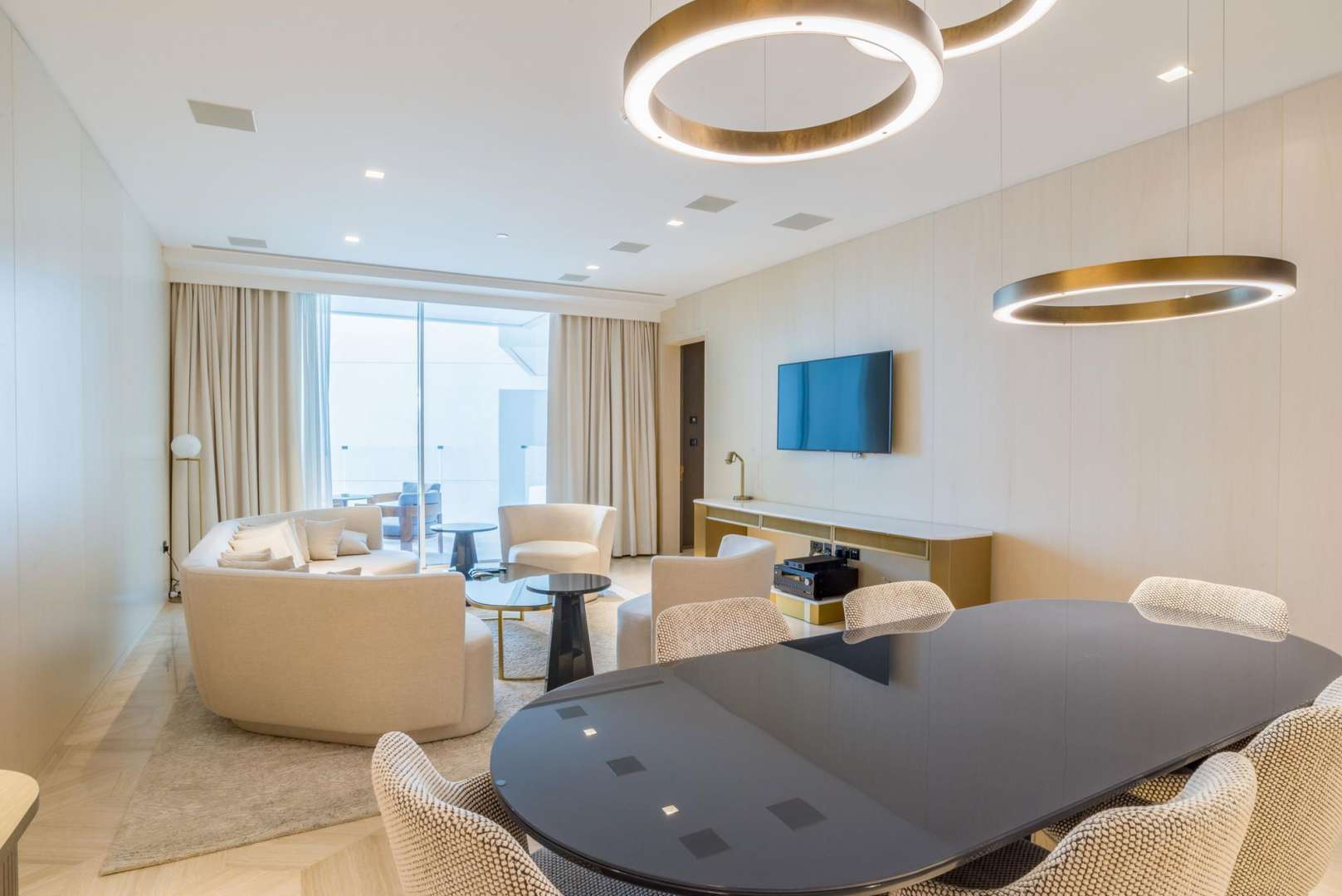 Luxury furnished bedroom in Palm Jumeirah apartment for sale, featuring elegant decor and lighting