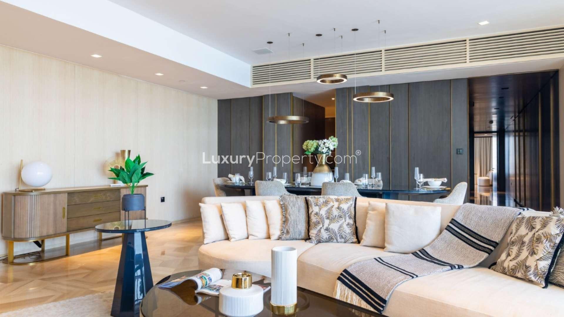 Luxurious dining and living area in Palm Jumeirah apartment with sea view and modern decor