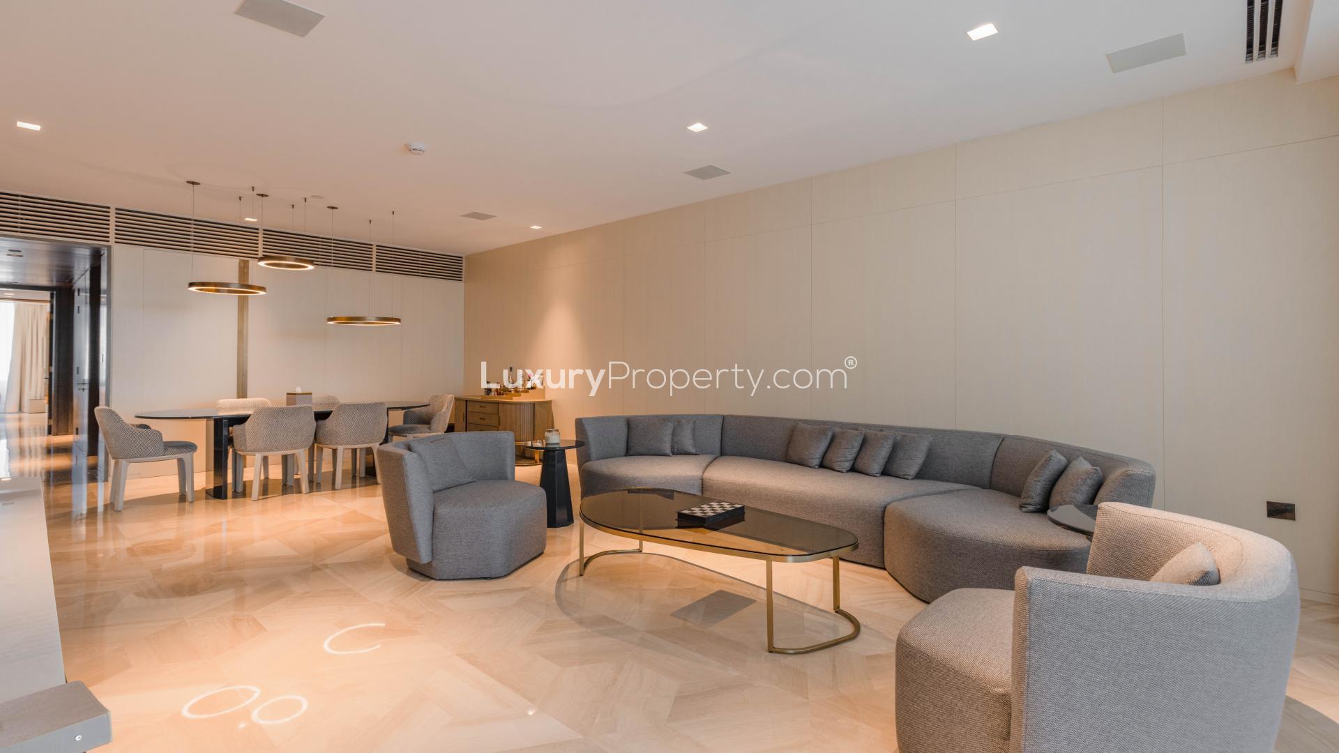 Luxurious living room in fully furnished Palm Jumeirah apartment, featuring modern decor and amenities