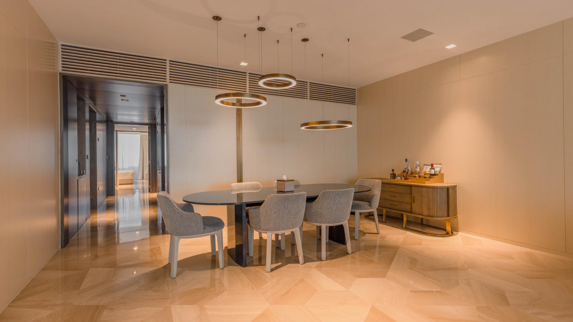 Fully furnished living room in FIVE Palm Jumeirah apartment with modern decor and seating