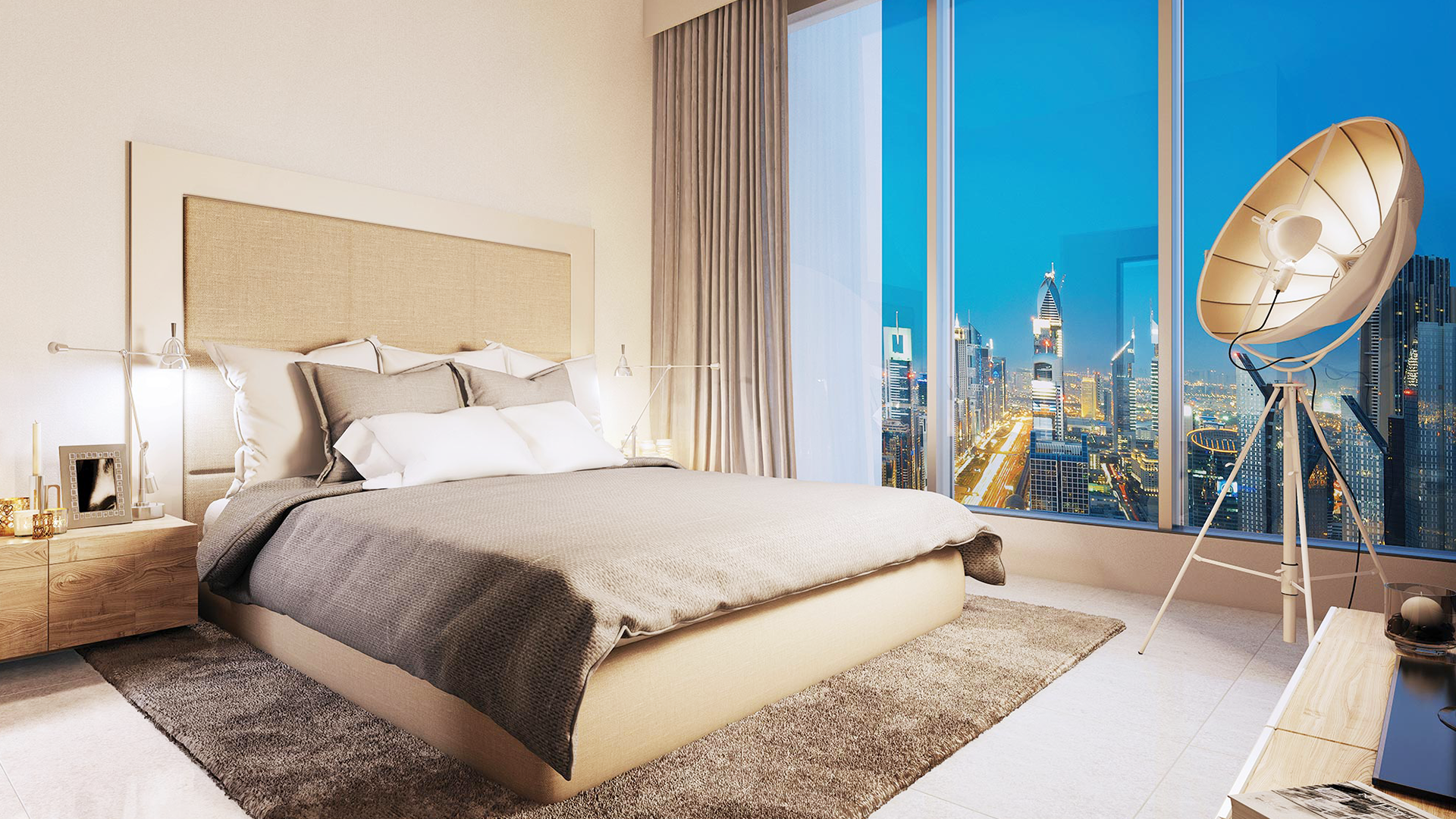 Luxurious bedroom in Forte 2 apartment with stunning Downtown Dubai skyline view at night