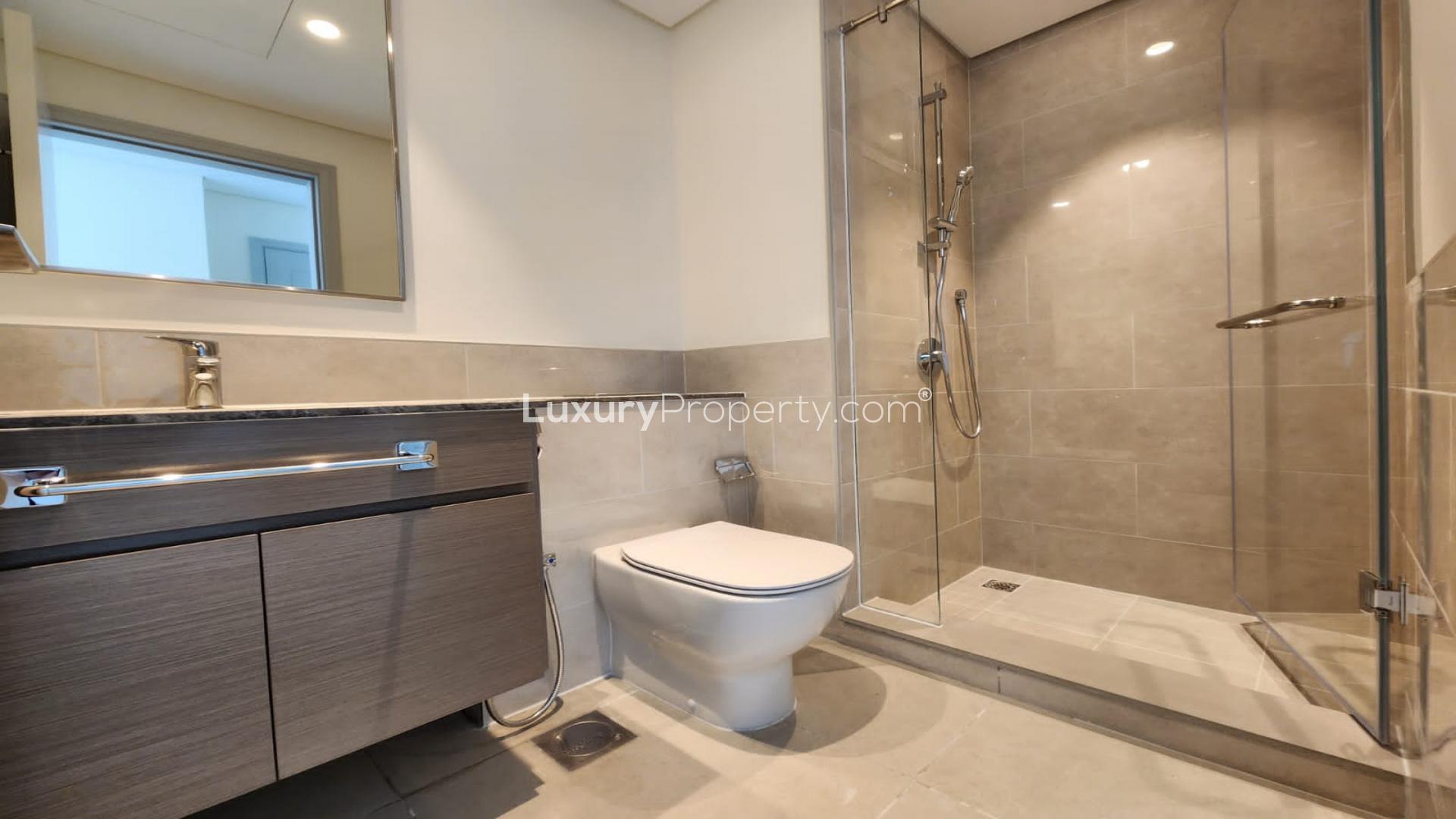 Modern bathroom in 3-bedroom apartment, Downtown Dubai, Forte sub-community, featuring glass shower