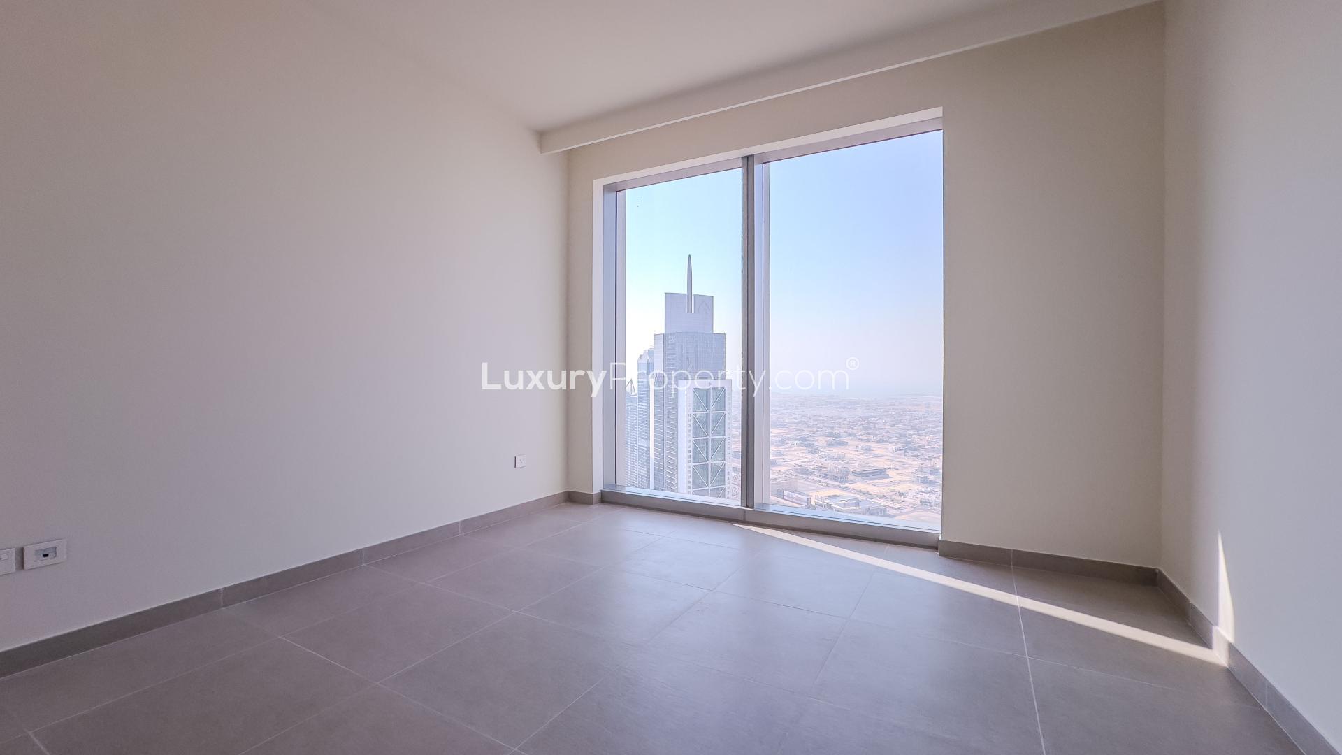 Modern kitchen and living area in Forte apartment, Downtown Dubai, with large windows