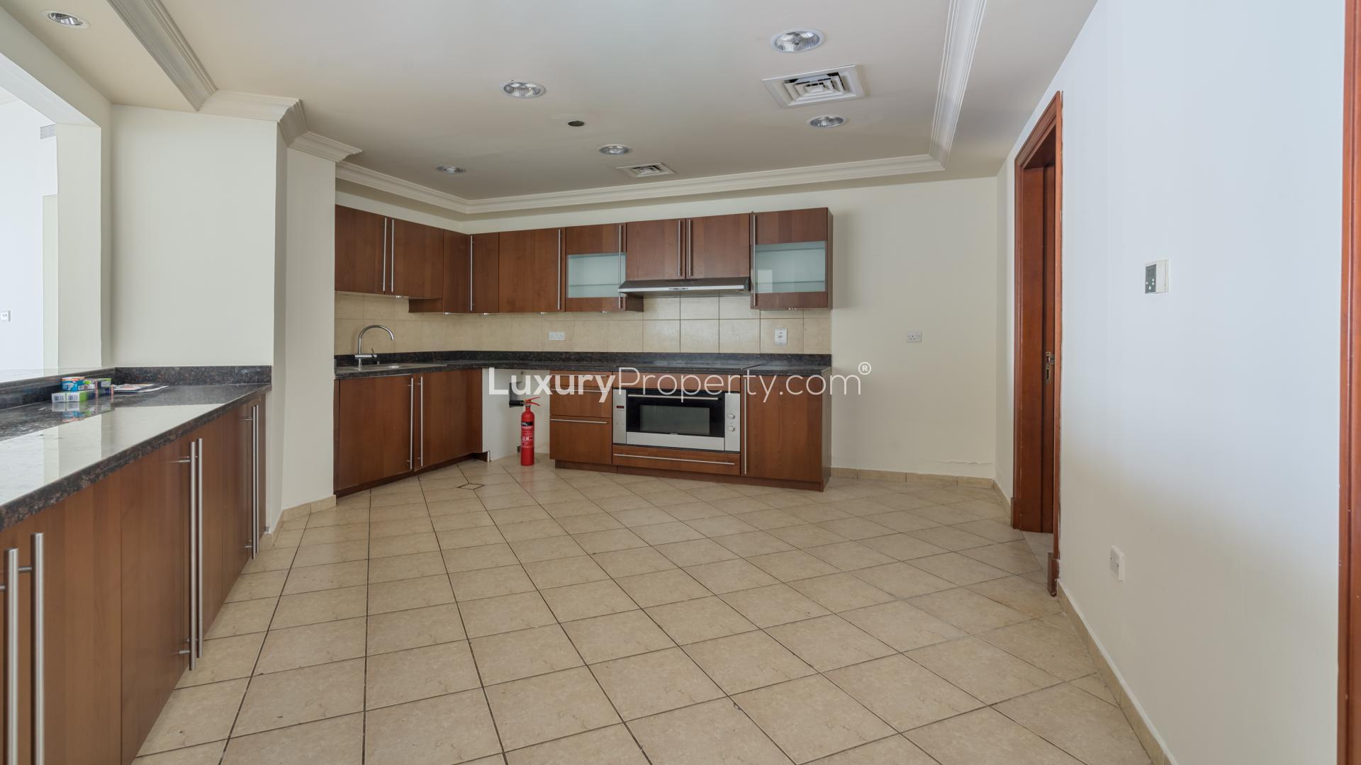 Open-plan living area in luxurious Palm Jumeirah apartment for sale, Golden Mile