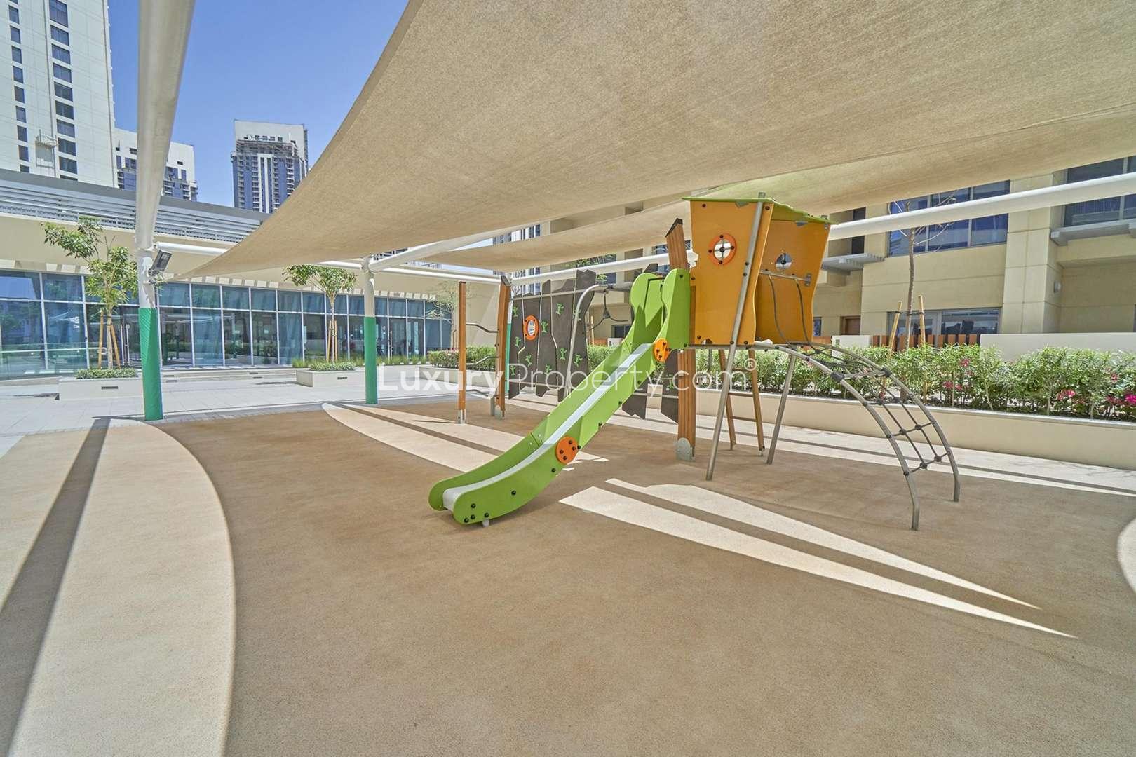 Harbour Views apartment complex with pool and downtown skyline view in Dubai Creek Harbour