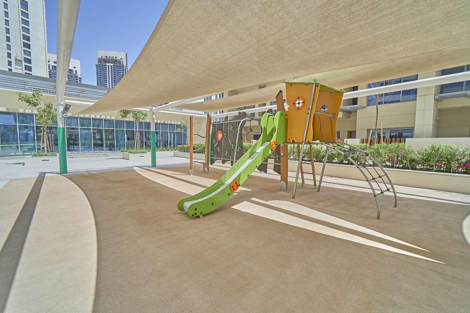 Harbour Views apartment complex with pool and downtown skyline view in Dubai Creek Harbour