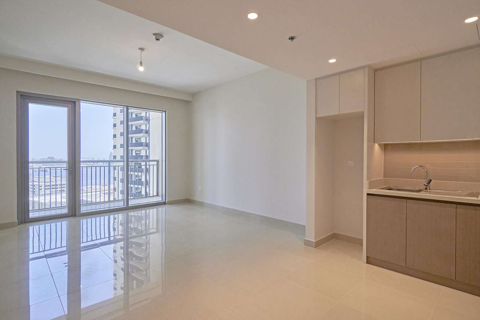 Luxurious living room in 3-bedroom apartment, Dubai Creek Harbour, elegant decor and ample seating