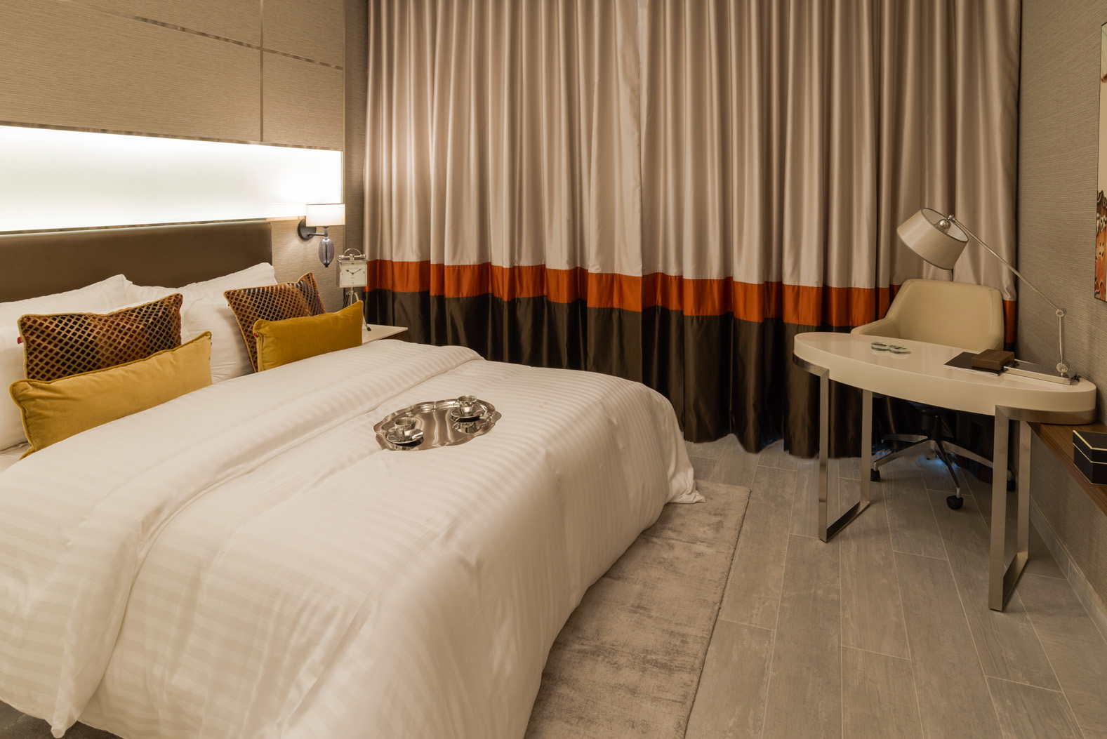 Elegant bathroom in 3-bedroom Downtown Dubai apartment, featuring modern fixtures and wooden accents