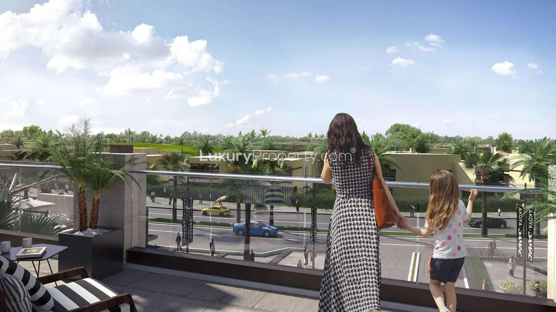 Furnished Kiara Apartment balcony with golf course view, Dubailand real estate for sale