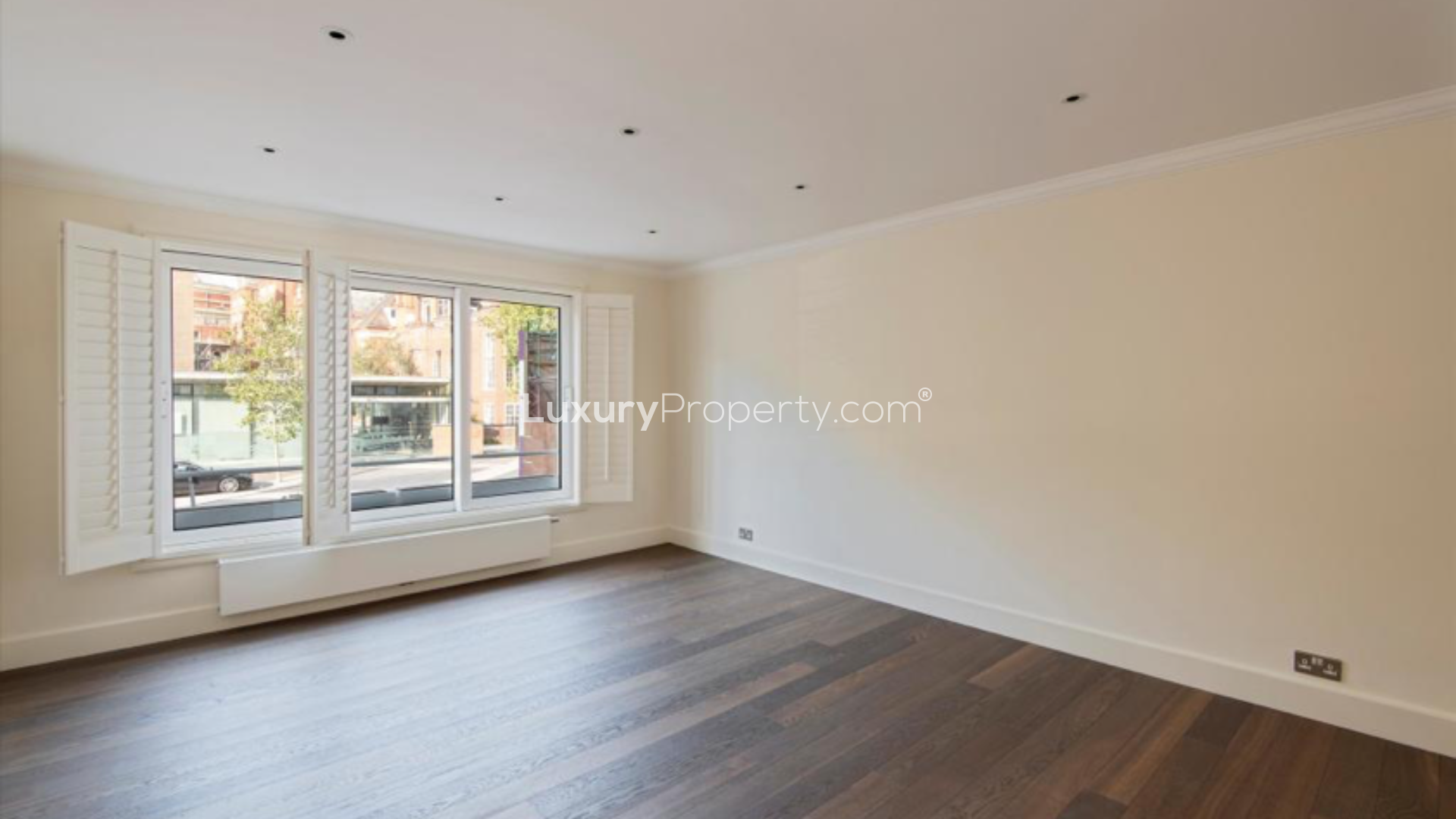 Elegant Knightsbridge apartment building exterior, London, three-bedroom property for sale