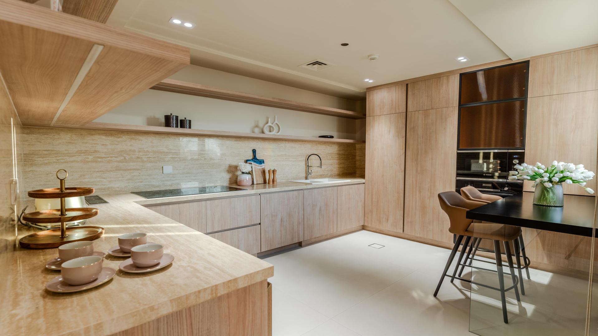 Modern kitchen in elegant 3-bedroom duplex apartment, Palm Jumeirah, Kingdom of Sheba