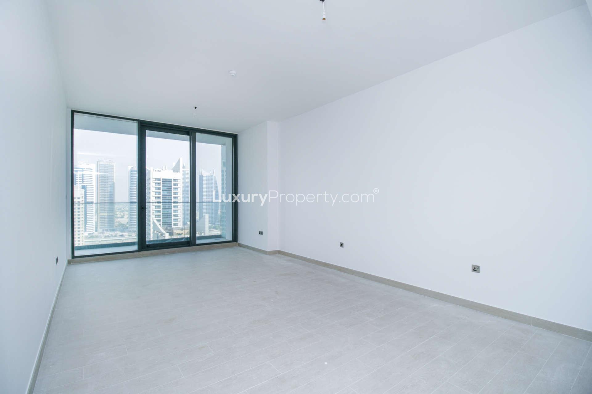 Spacious kitchen and living area with city view in Dubai Marina apartment for sale