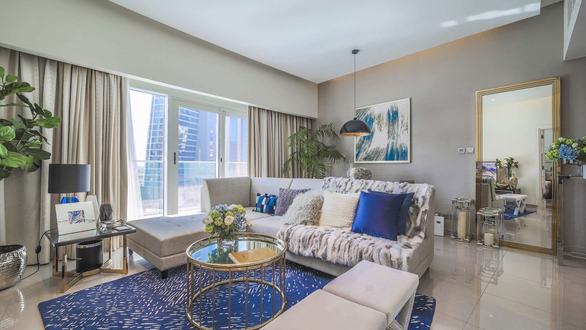 Luxurious living room in Maison Majestine apartment for sale, featuring elegant decor and seating