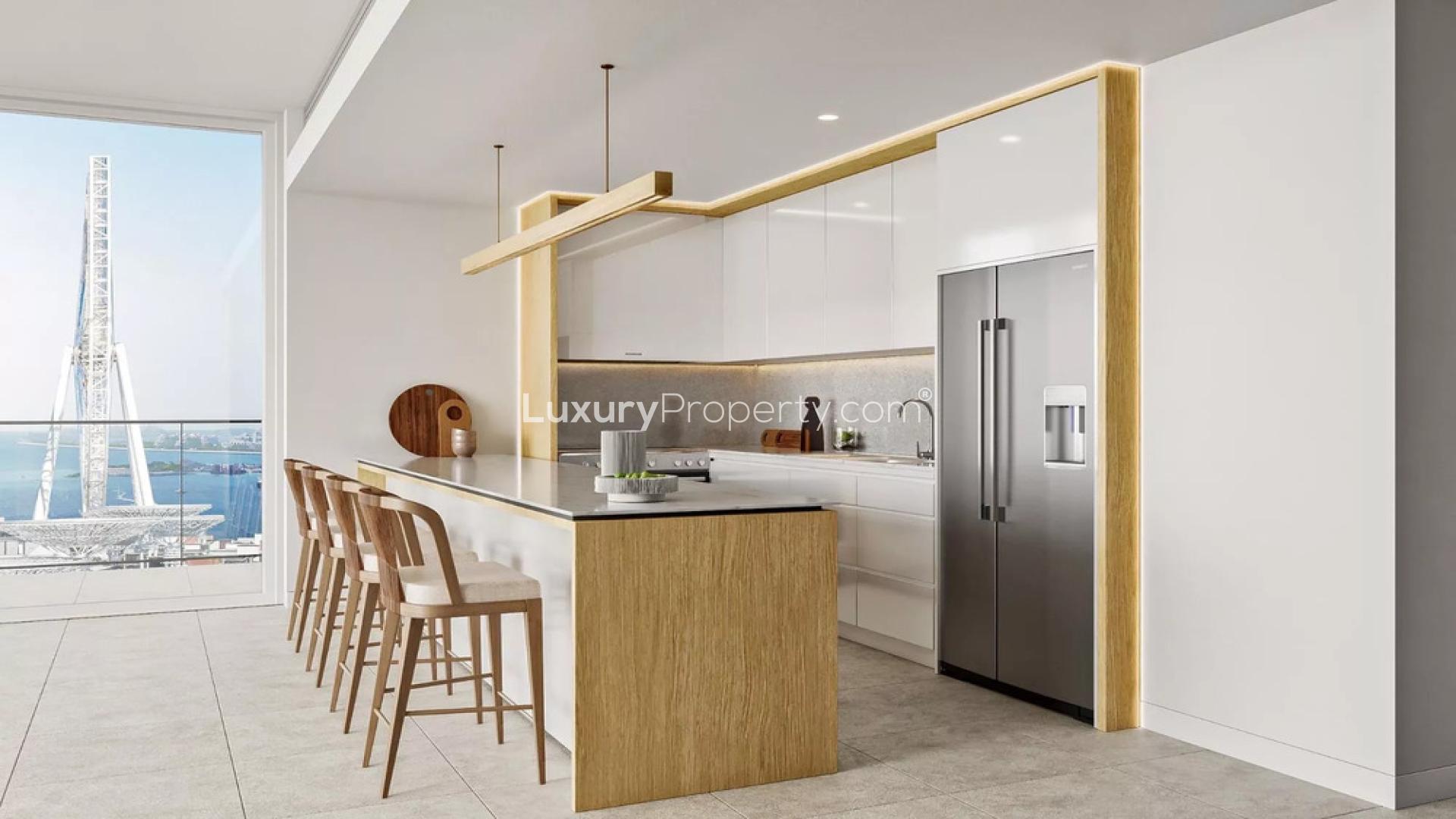 Sea view living room in Bluewaters Bay Tower 1 apartment with modern decor and large windows