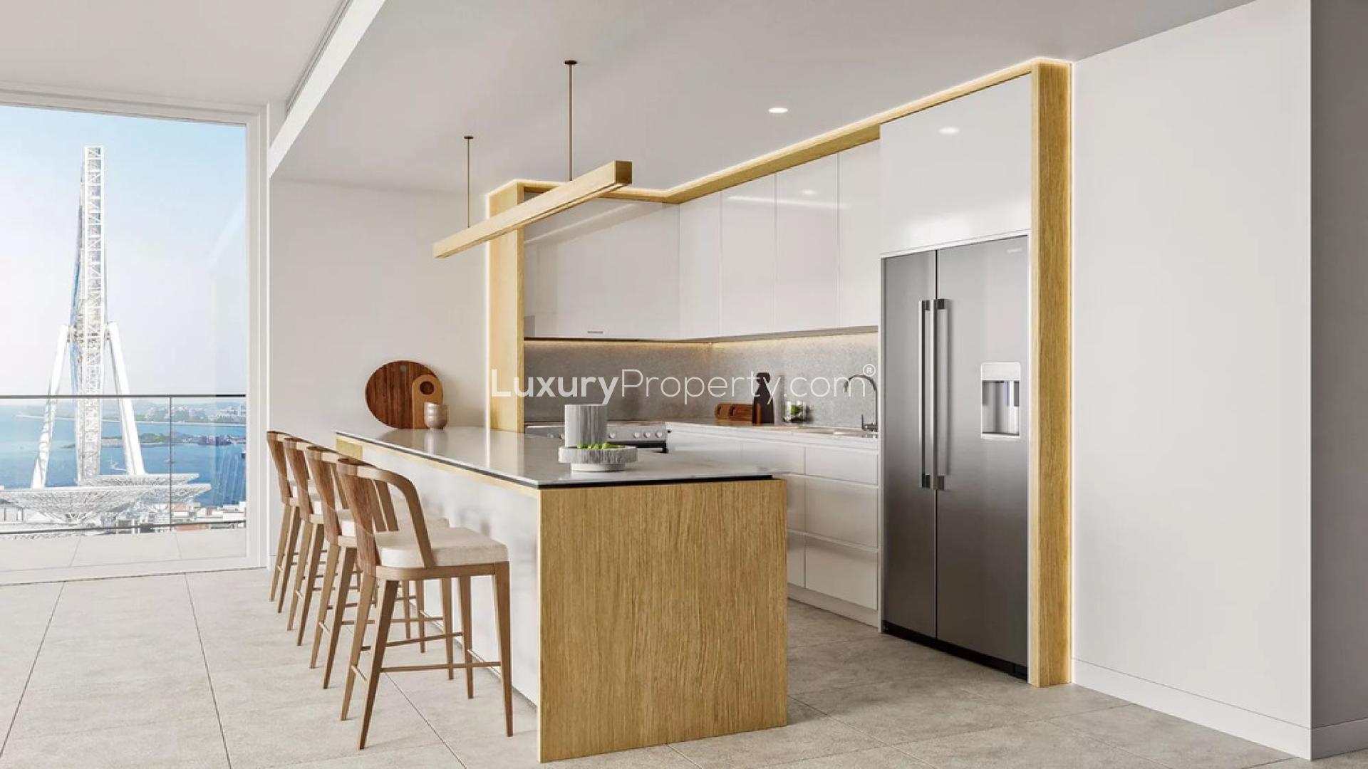 Luxurious Bluewaters Bay apartment with ocean view, modern living room, and dining area