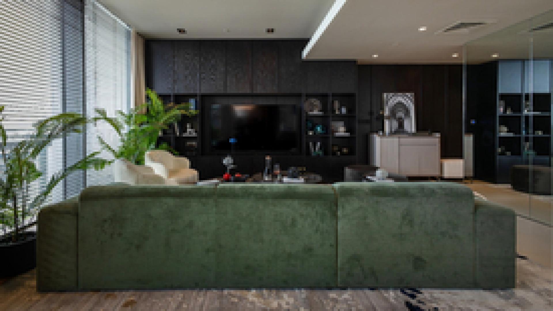 Luxurious living room in Bluewaters Dubai apartment with modern decor and greenery
