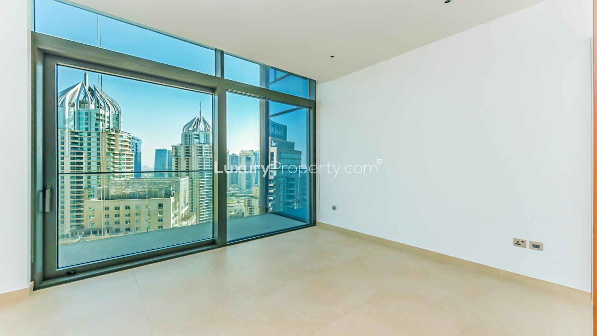 Bright living area in high-floor Marina Gate apartment, Dubai Marina, with city views