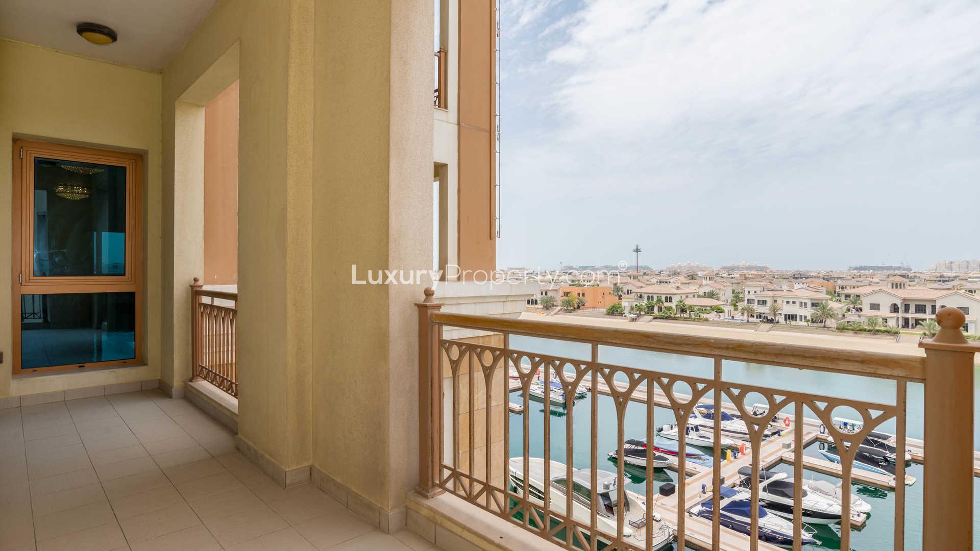 Empty living room with wooden floors in Marina Residences apartment, Palm Jumeirah for sale