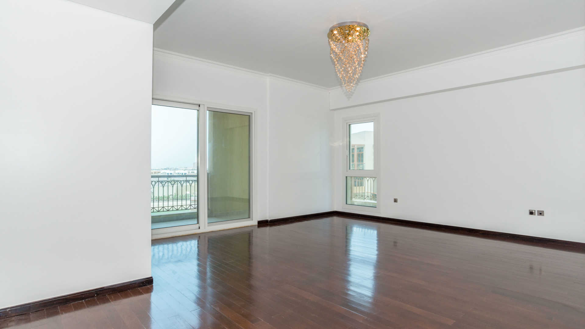 Empty room with wooden doors and tiled floor in Marina Residences, Palm Jumeirah apartment