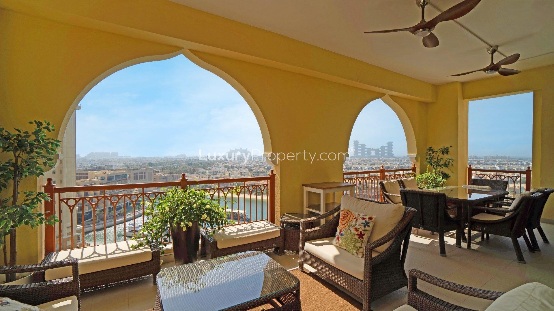 Modern kitchen in 3-bedroom apartment, Marina Residence, Palm Jumeirah, with island and artwork