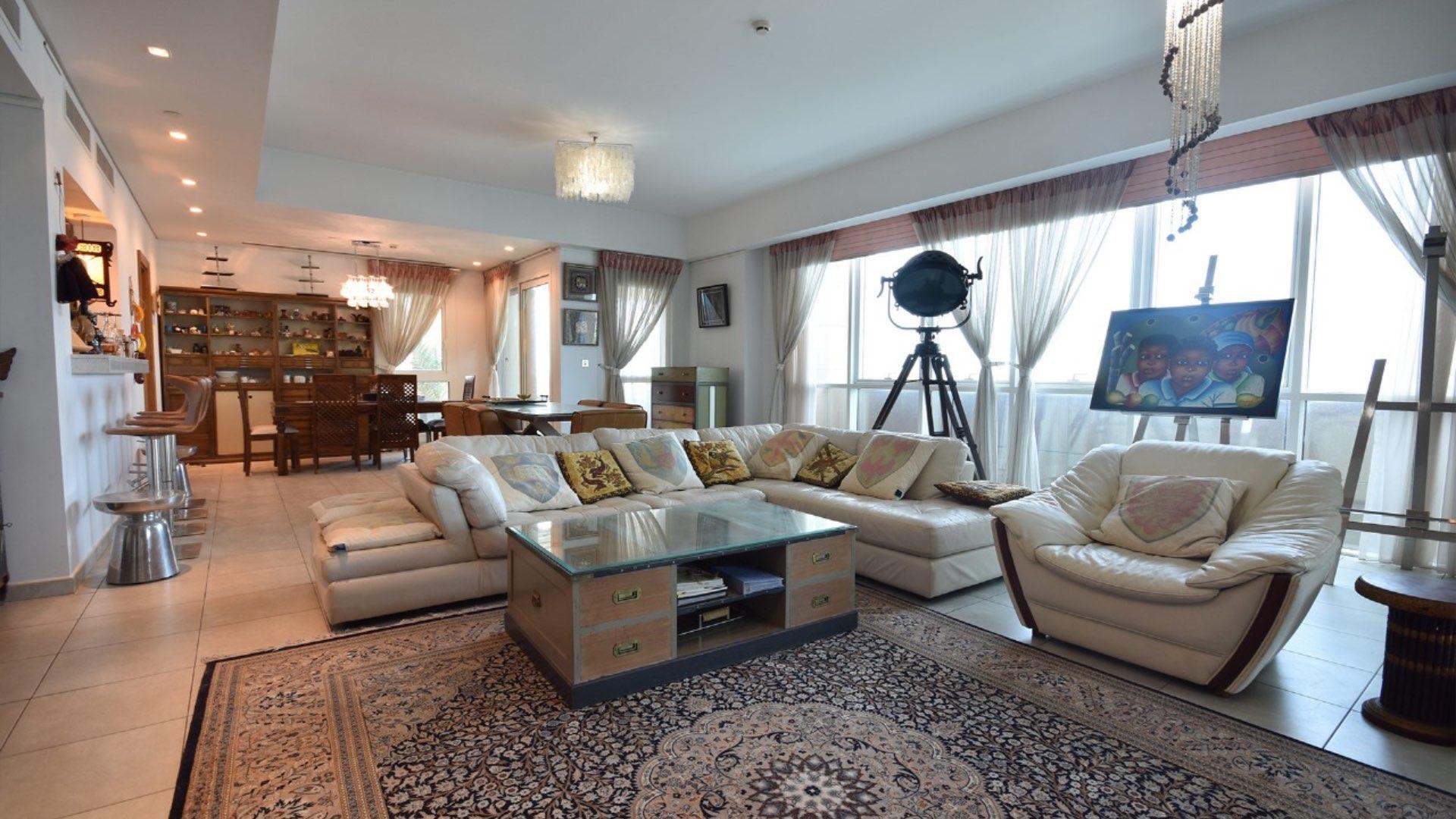 Luxury Marina View from Palm Jumeirah Apartment Terrace, Featuring Docked Yachts and Blue Sky