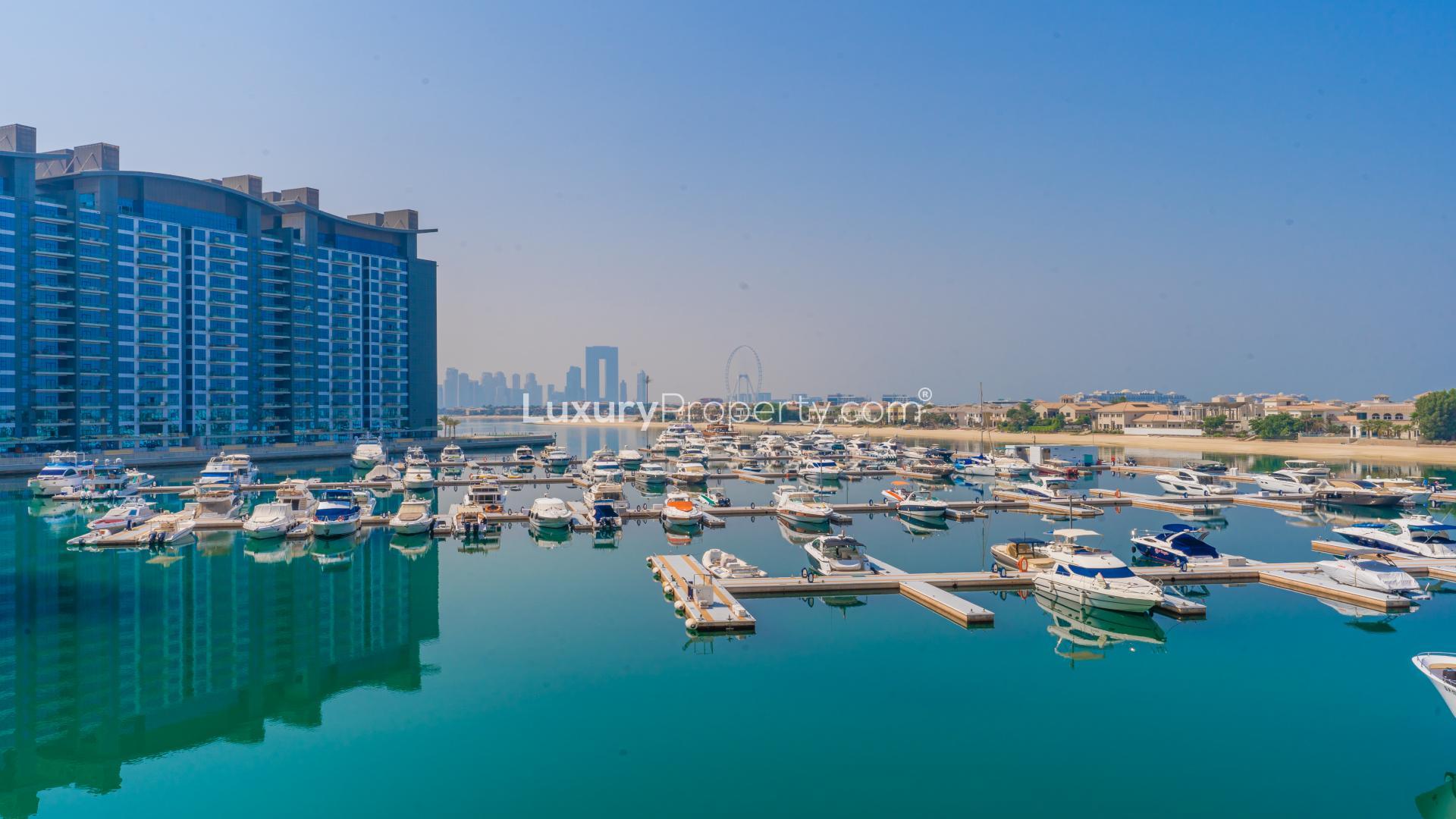 Renovated office space in luxury Palm Jumeirah apartment, modern decor and stylish furnishings